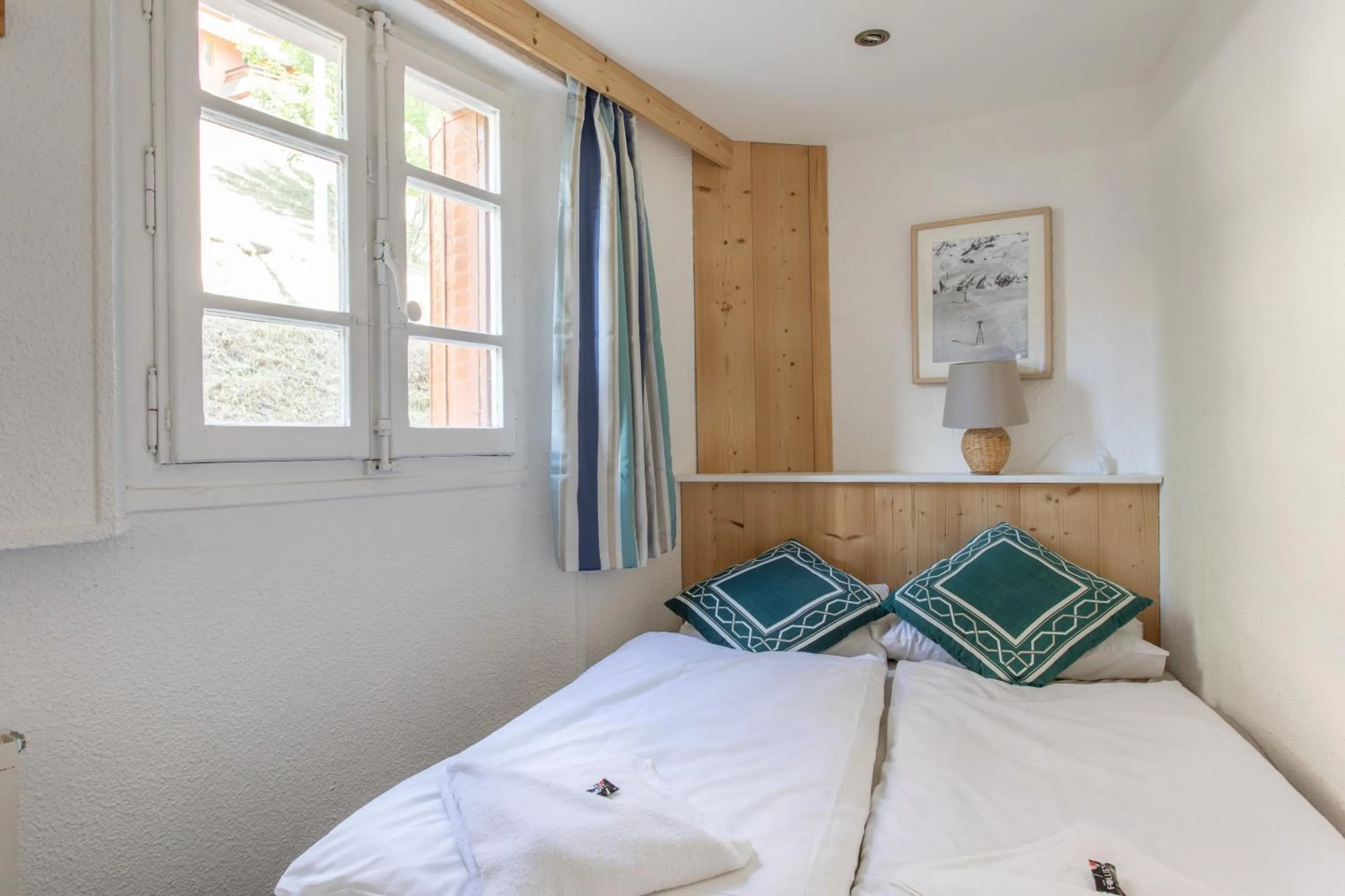 Bed in Hotel le Chamois