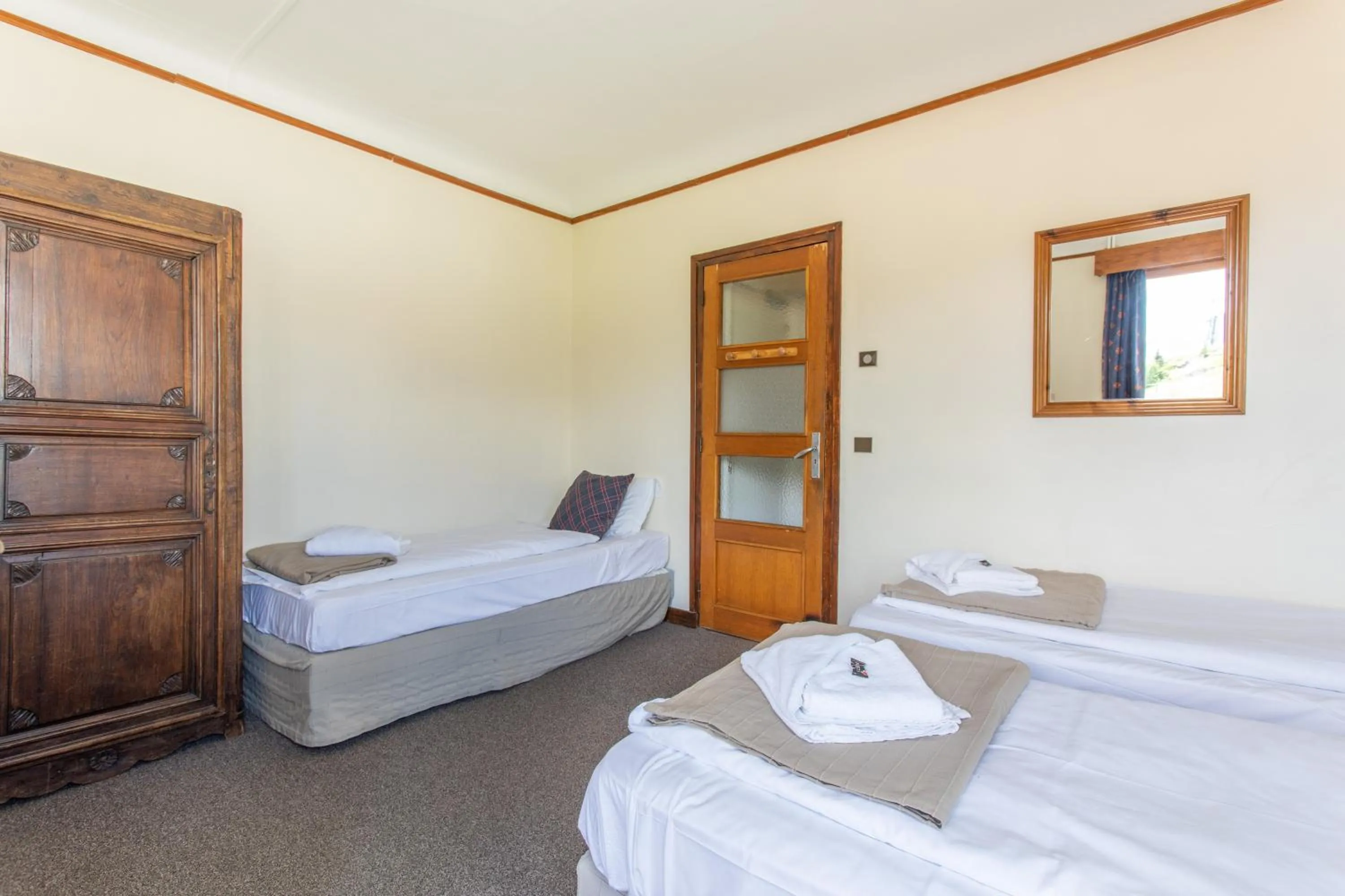 Bed in Hotel le Chamois