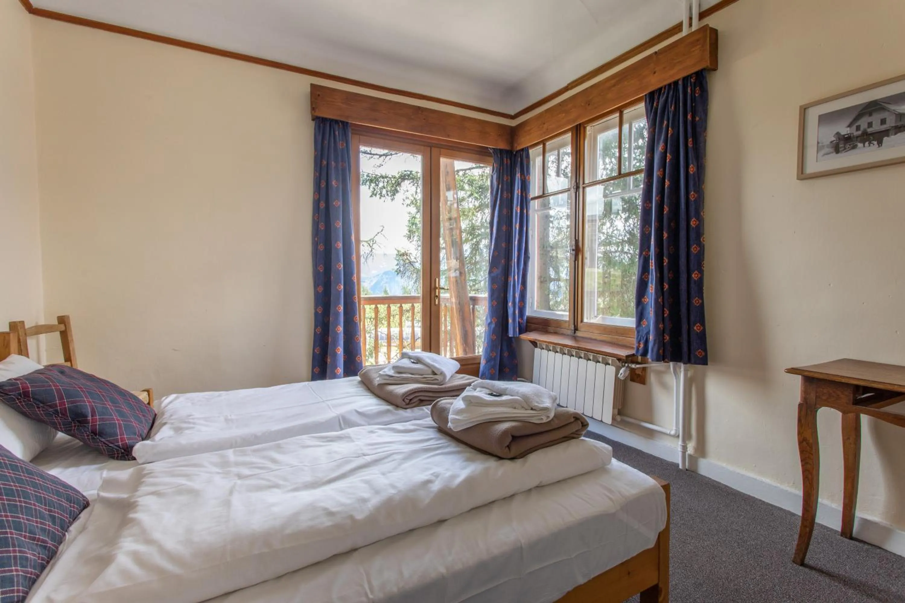 Bed in Hotel le Chamois