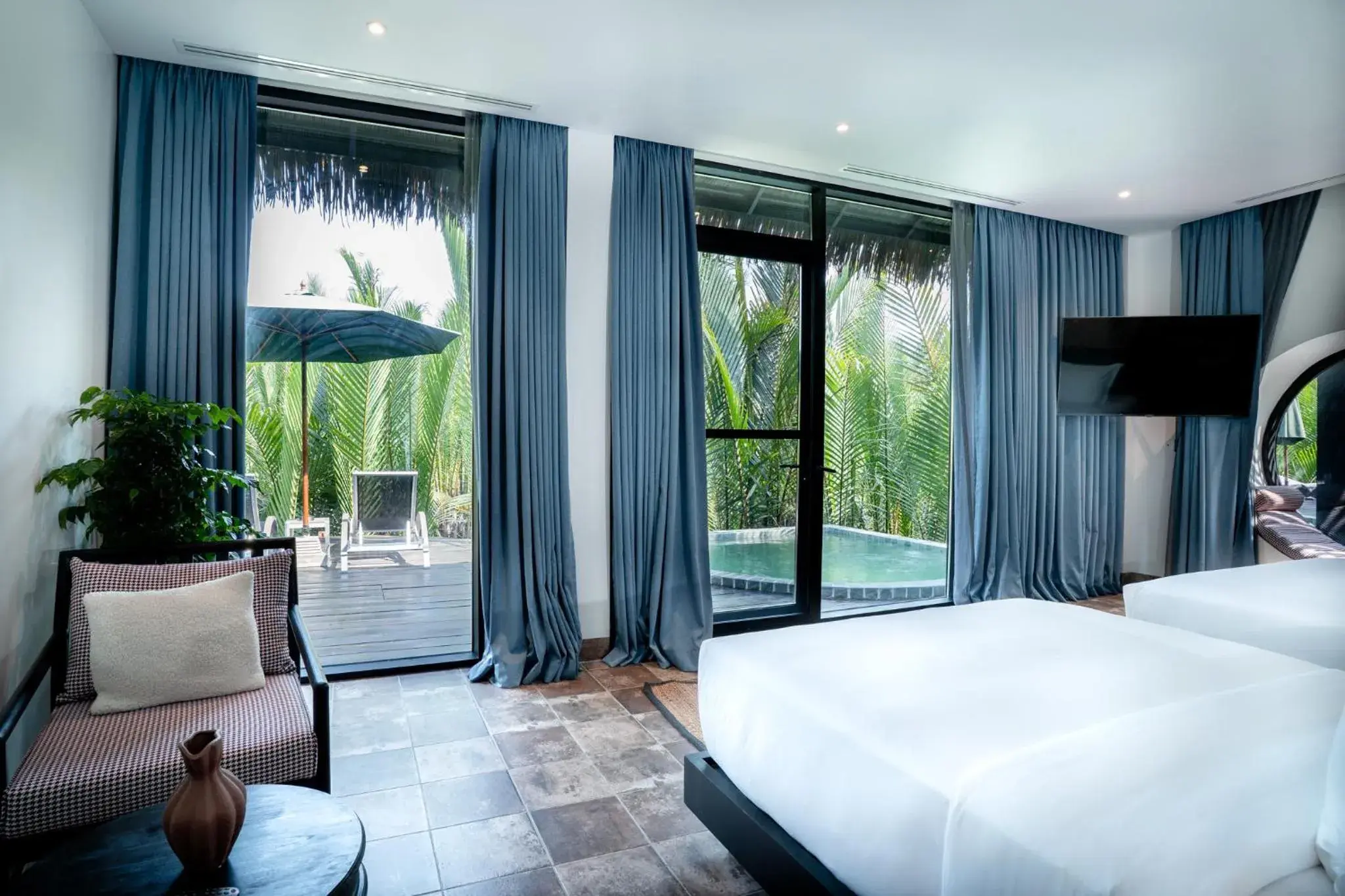 Bed in RiverTree Villa & Resort Bed in RiverTree Villa & Resort