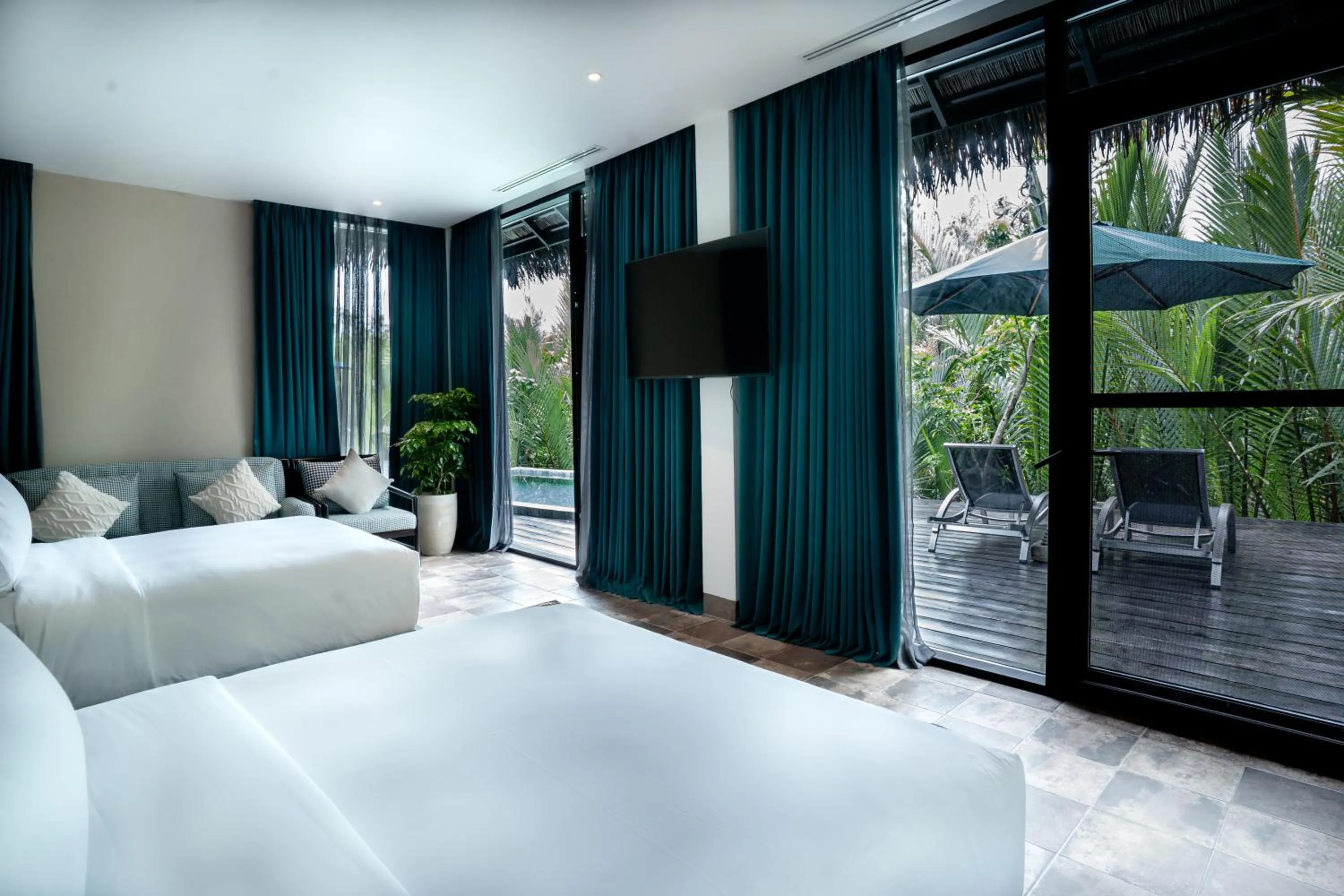 Bed in RiverTree Villa & Resort