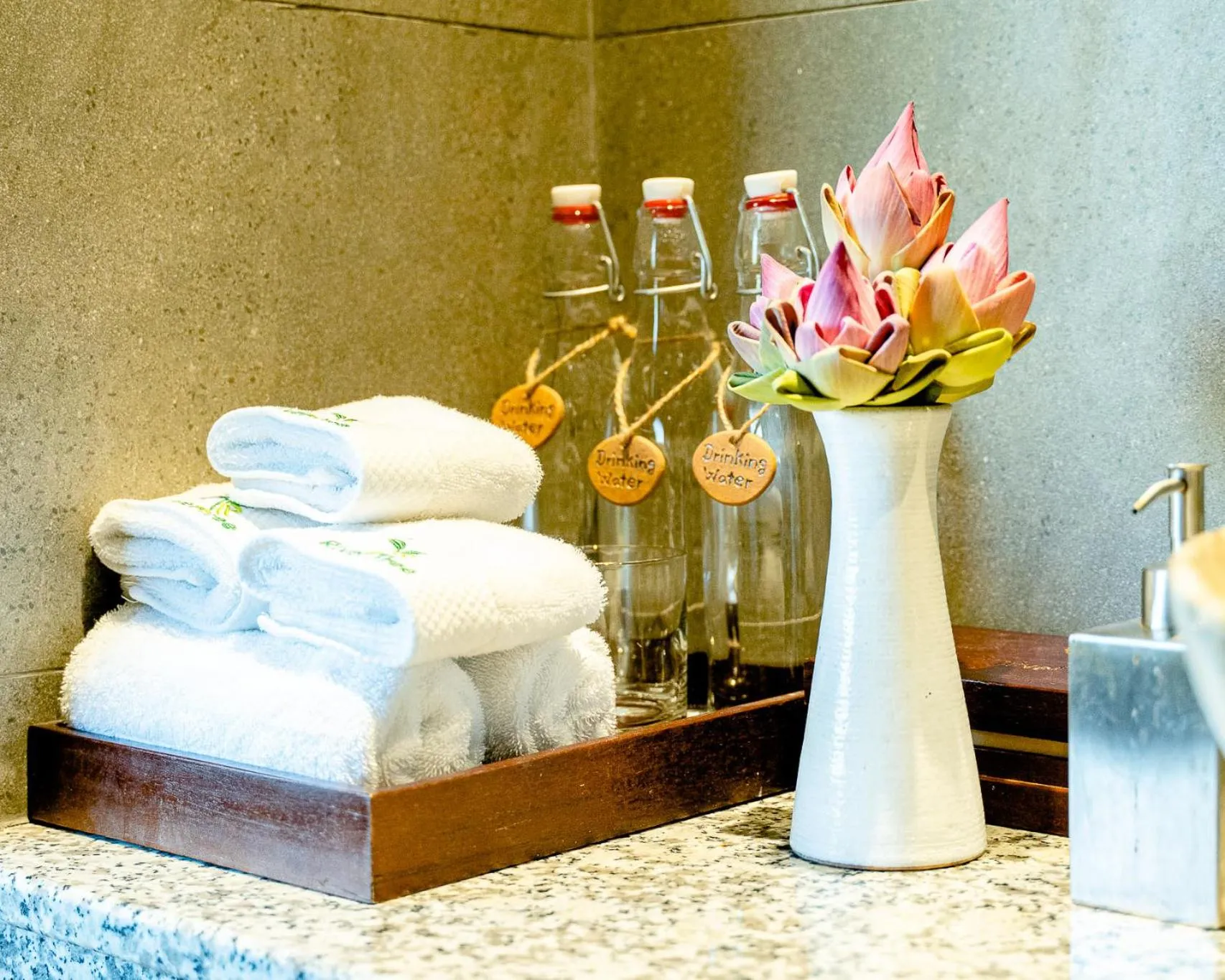 towels, Bed in RiverTree Villa & Resort