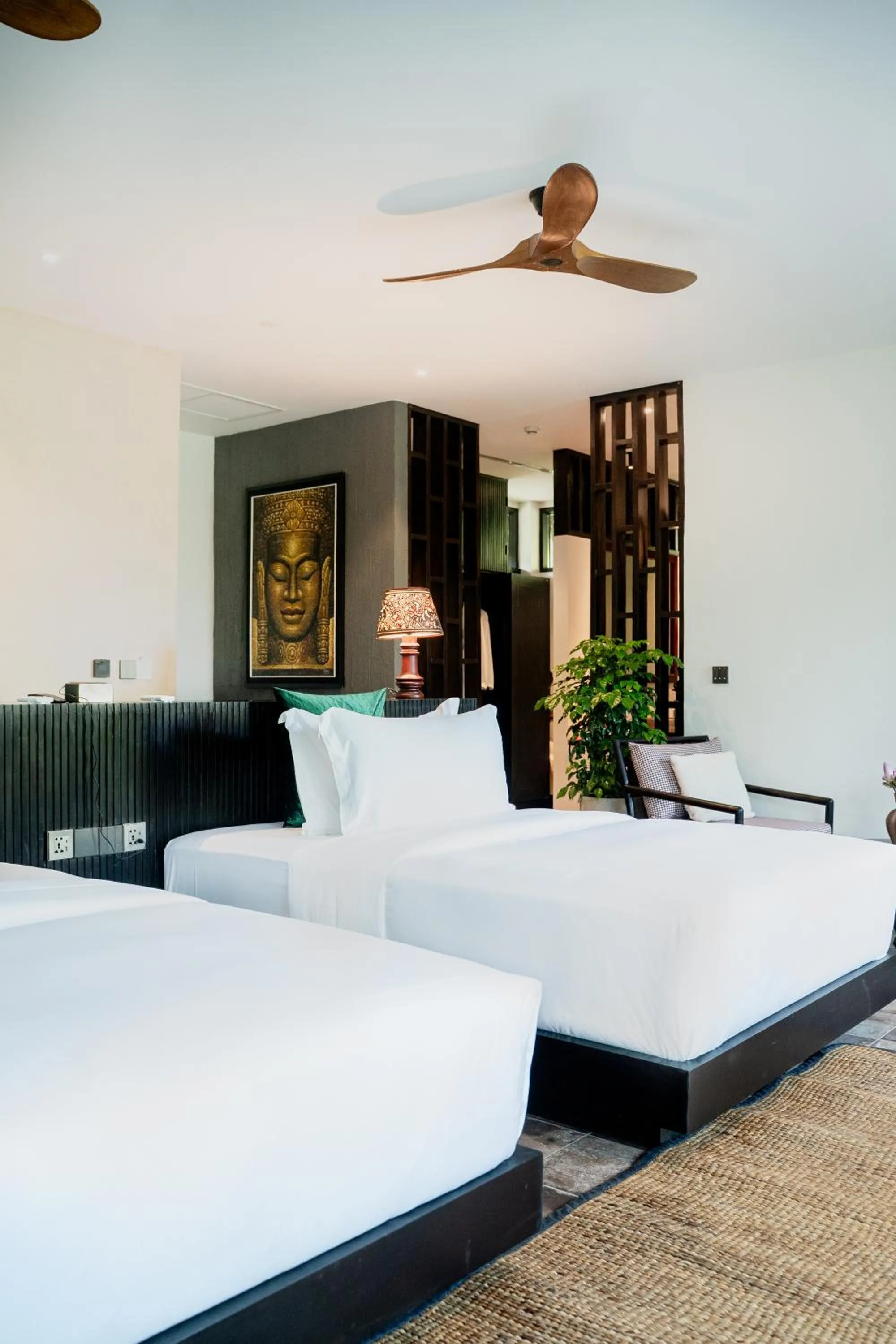 Bed in RiverTree Villa & Resort