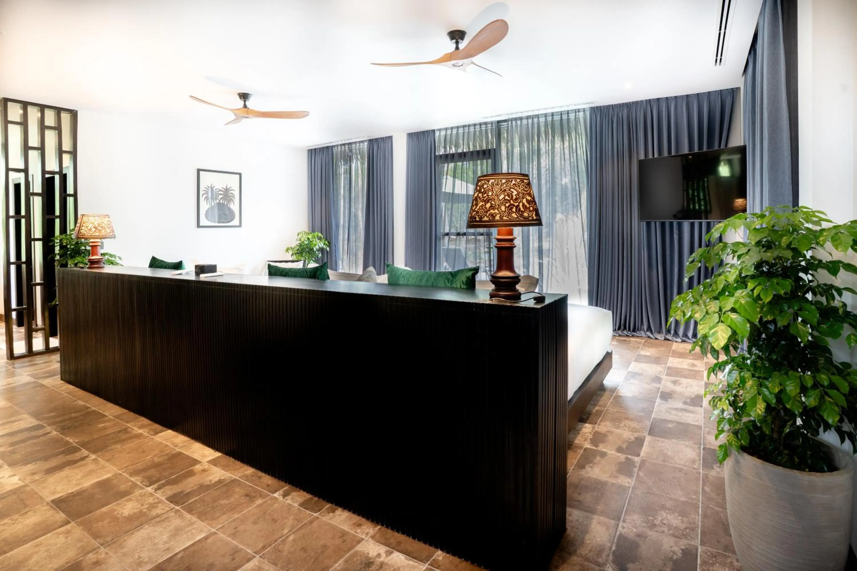 Bed in RiverTree Villa & Resort