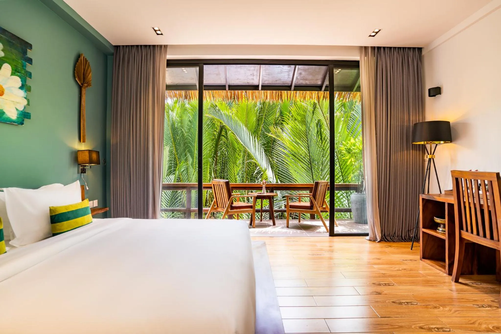 Bed in RiverTree Villa & Resort