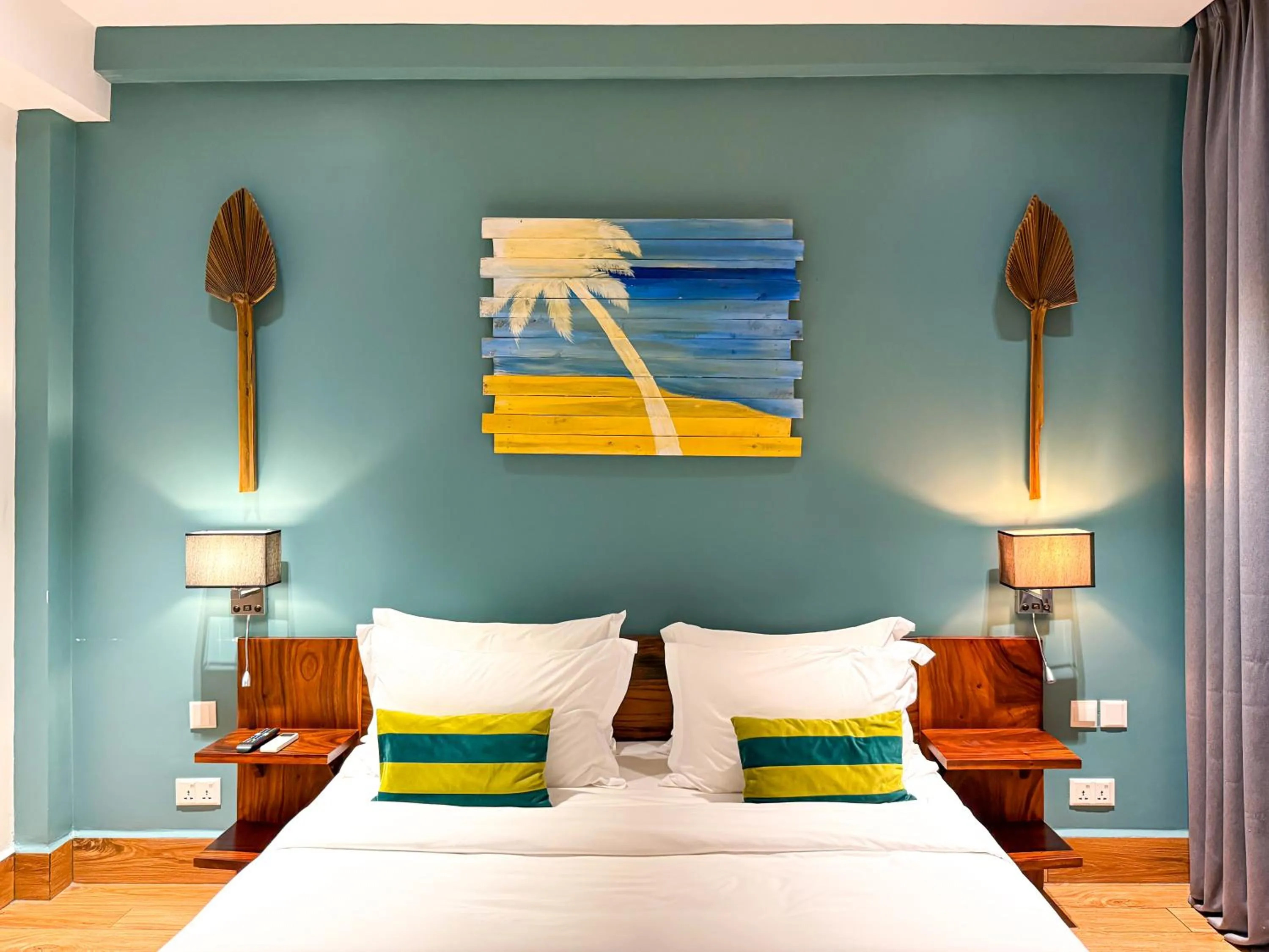 Bed in RiverTree Villa & Resort