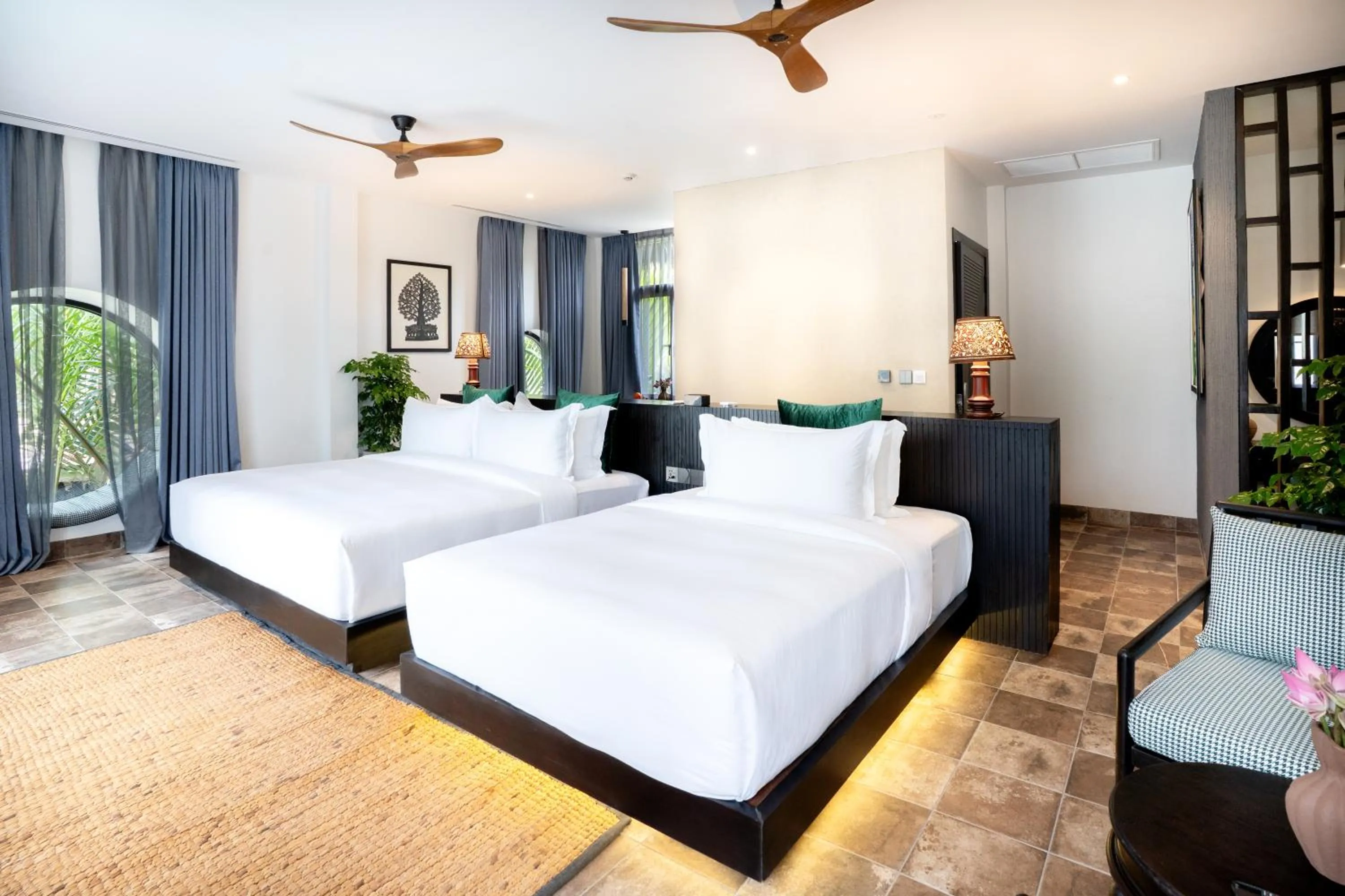 Bed in RiverTree Villa & Resort