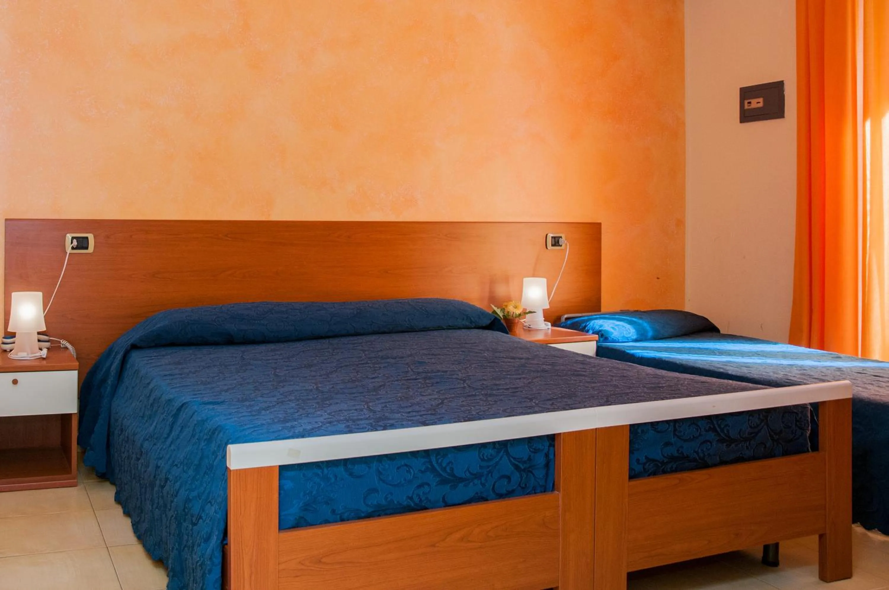 Bed in Megaron Hotel