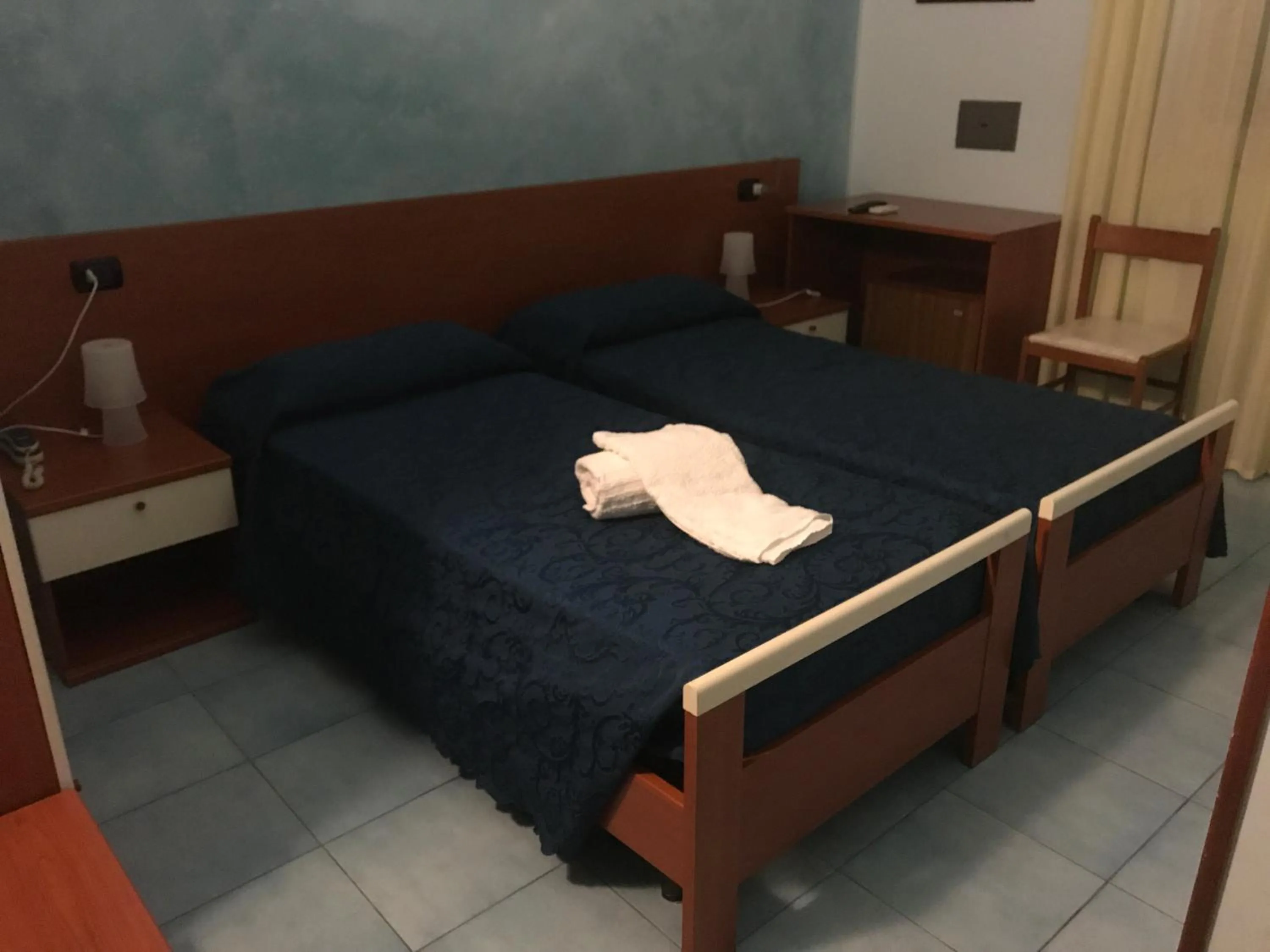 Bed in Megaron Hotel