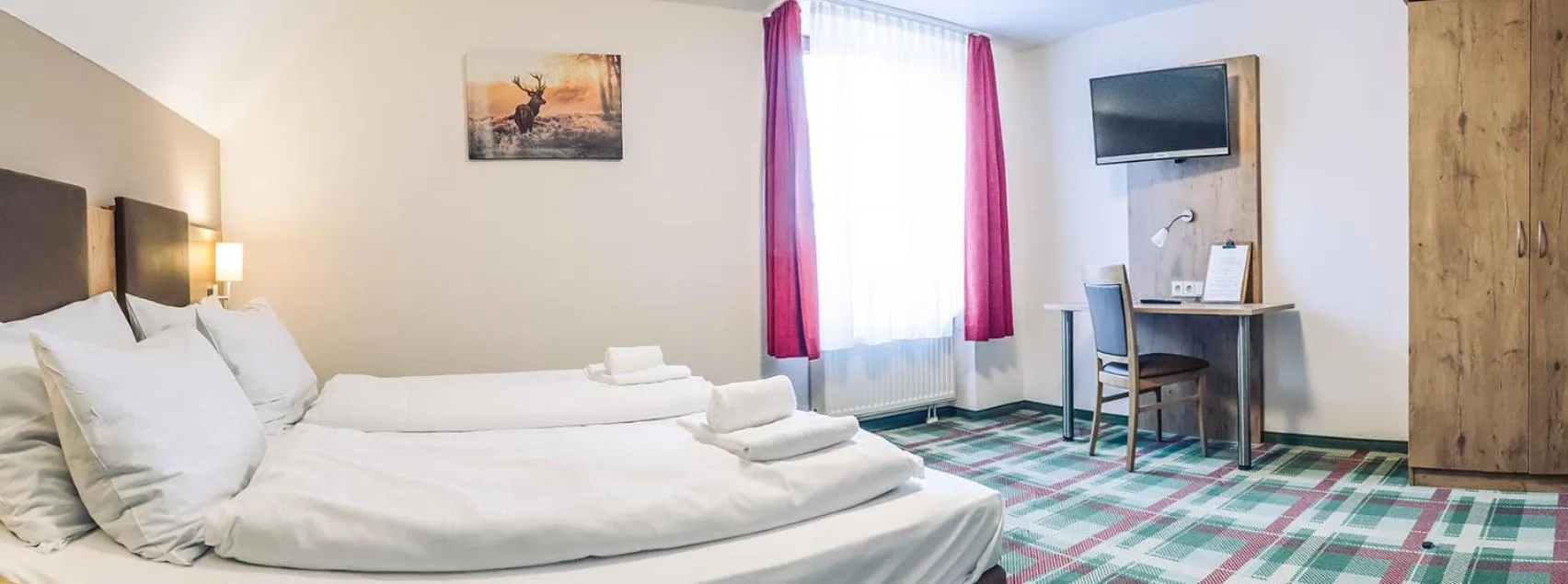 Bed in Gasthaus Kampenwand Bernau