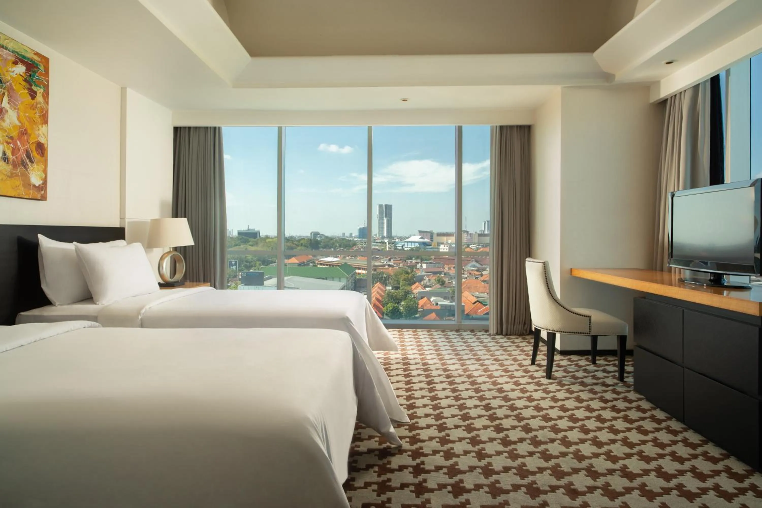 Bed in ARTOTEL TS Suites Surabaya