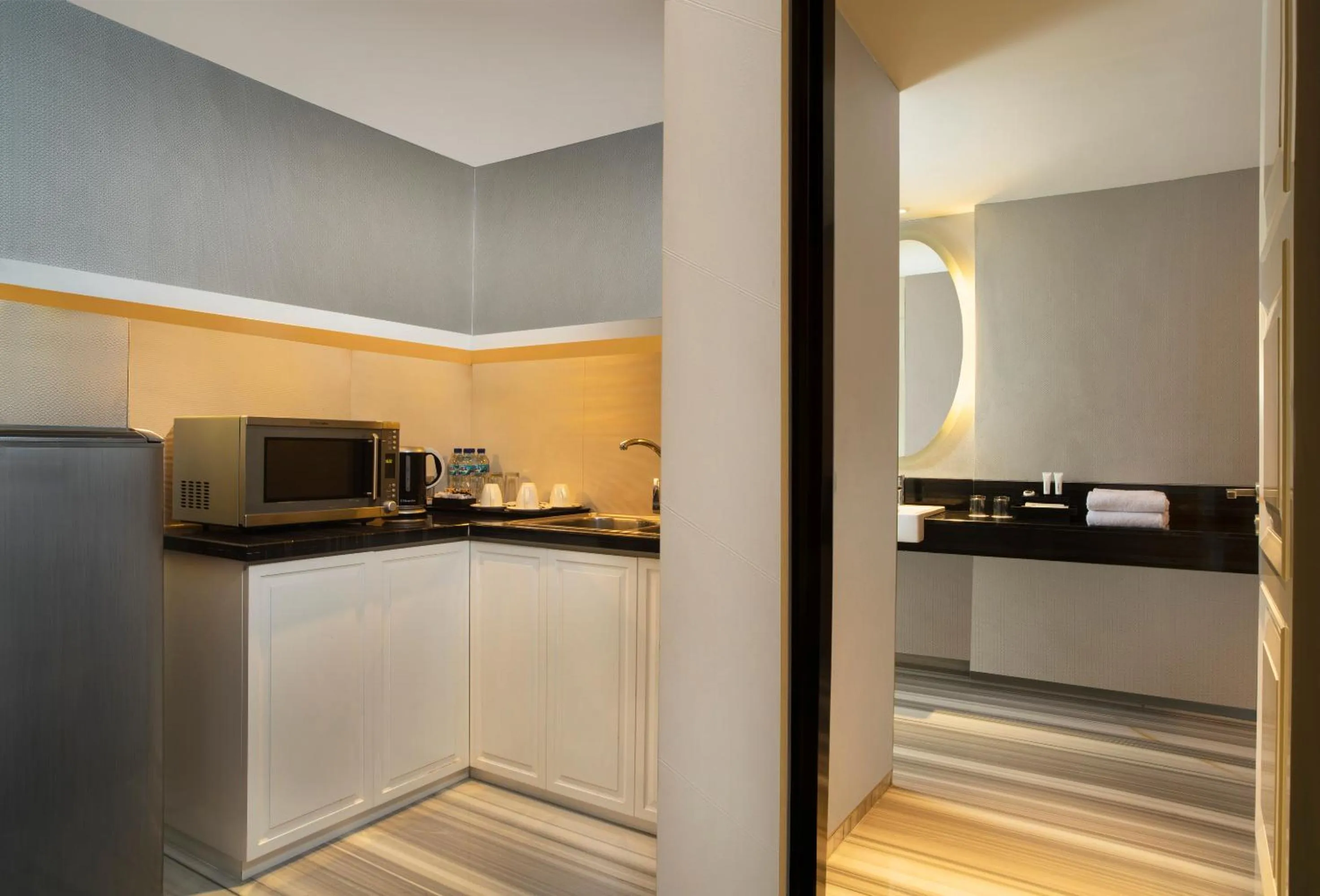 Kitchen or kitchenette in ARTOTEL TS Suites Surabaya