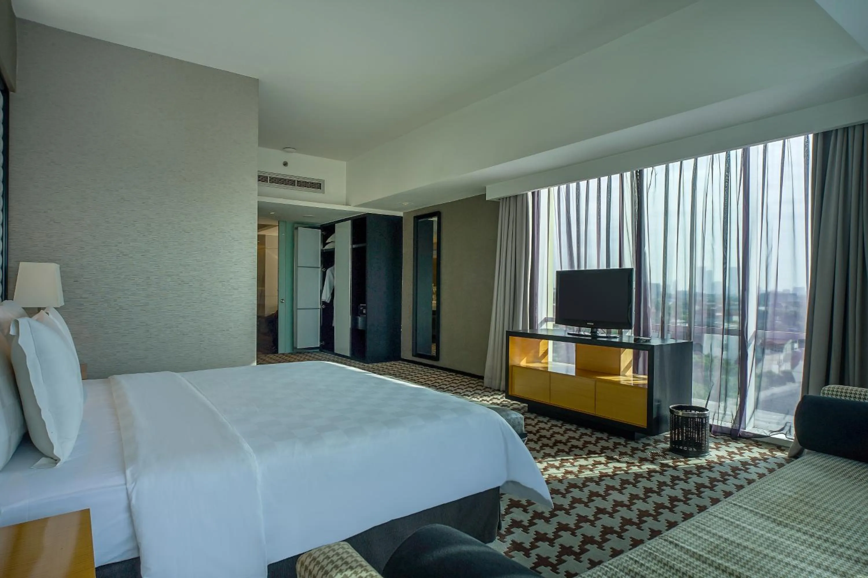 Bed in ARTOTEL TS Suites Surabaya