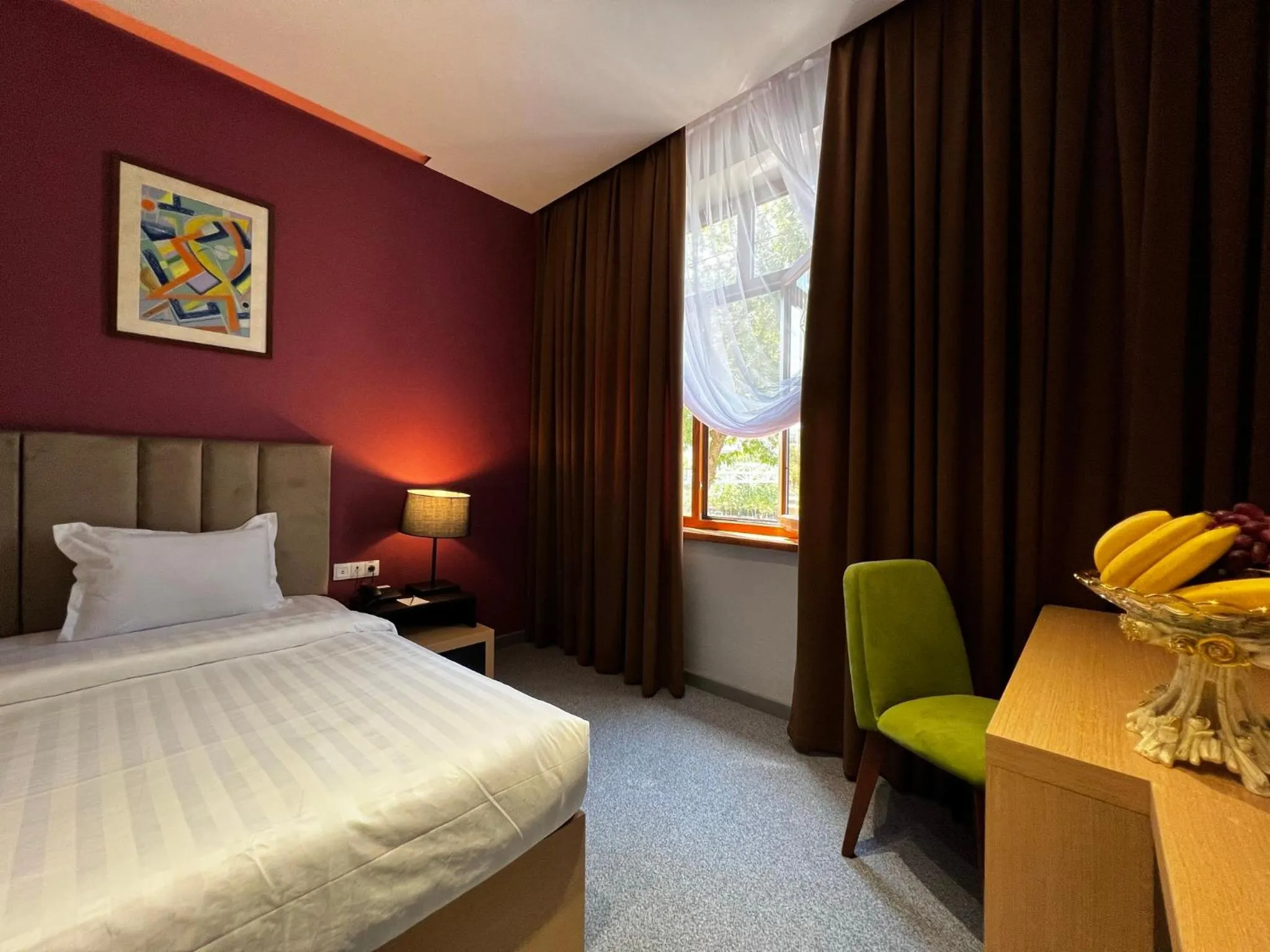 Bed in King Plaza Hotel