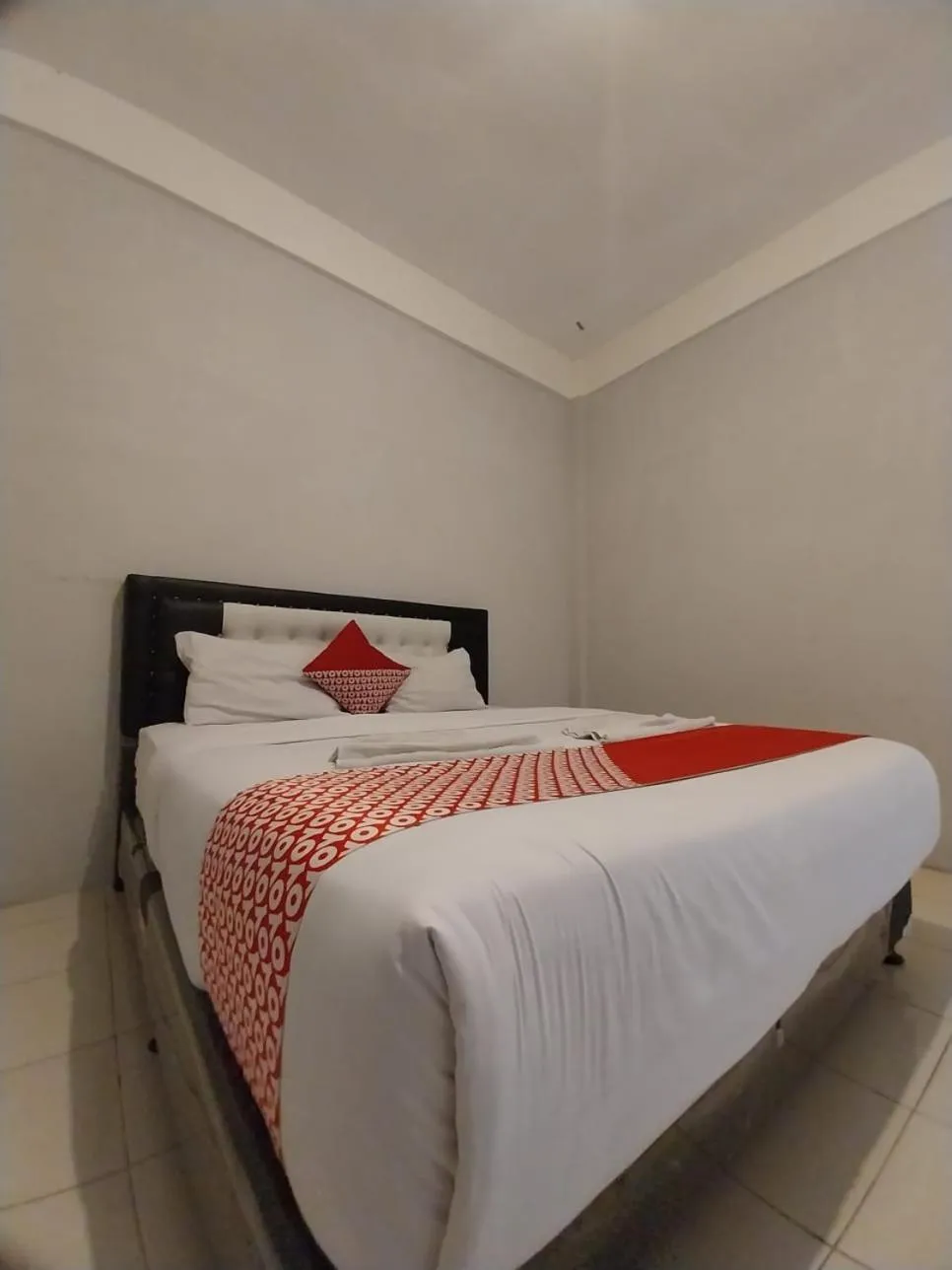 Bed in Dnaiko Syariah Hotel