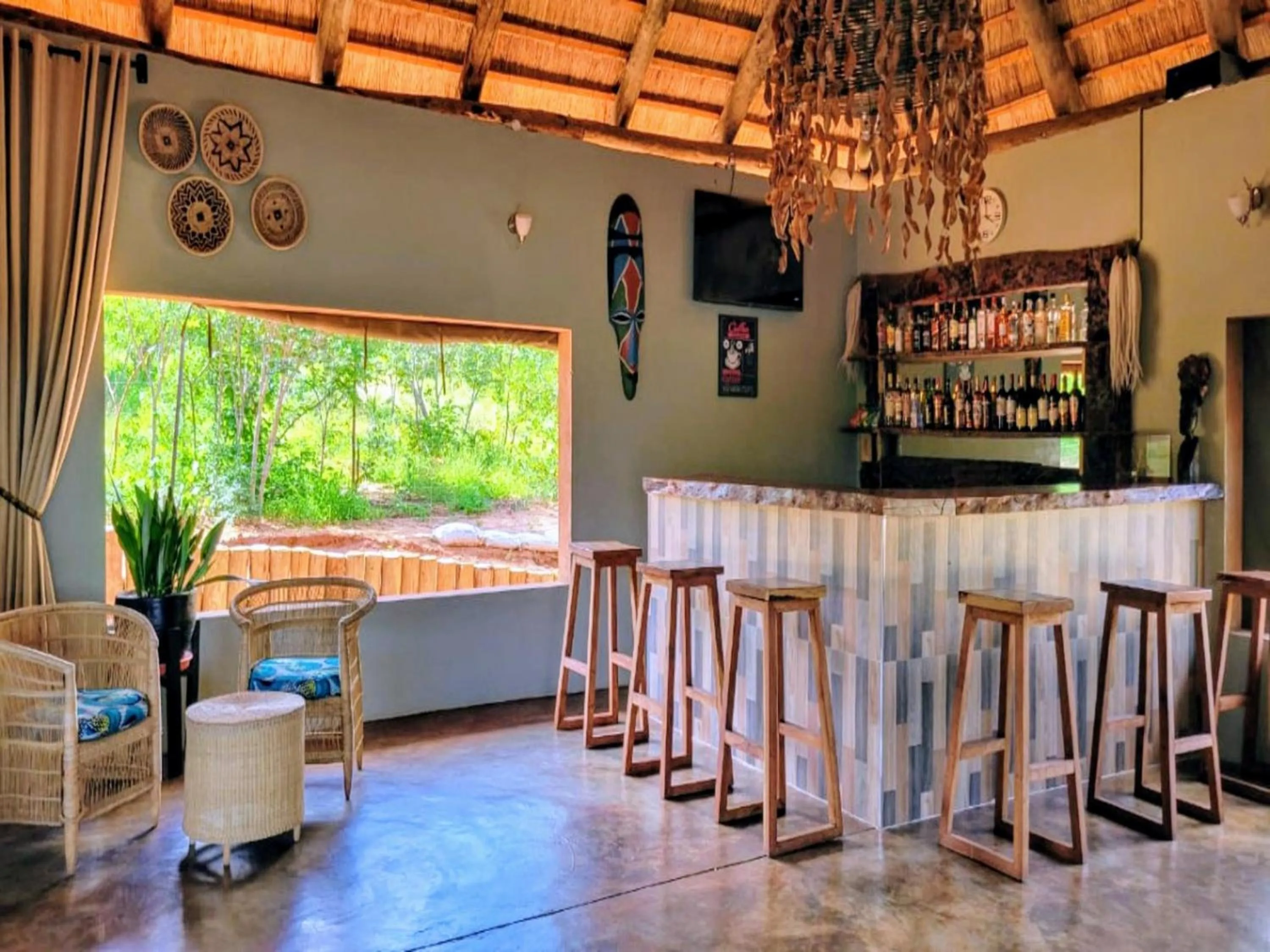 Lounge or bar in The Nkhosi Livingstone Lodge and Spa