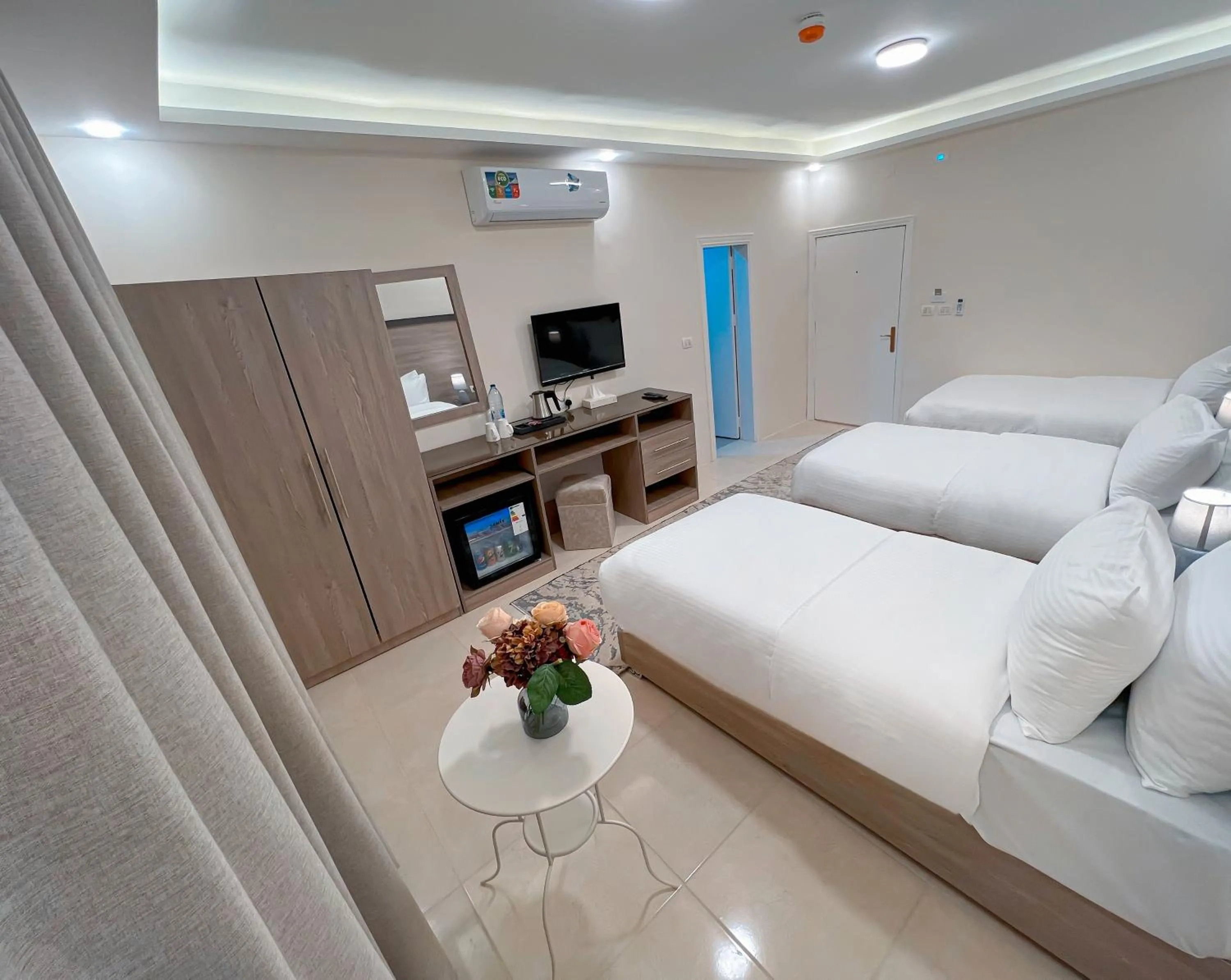 Communal lounge/ TV room, Bed in Beit Alshabaan Inn