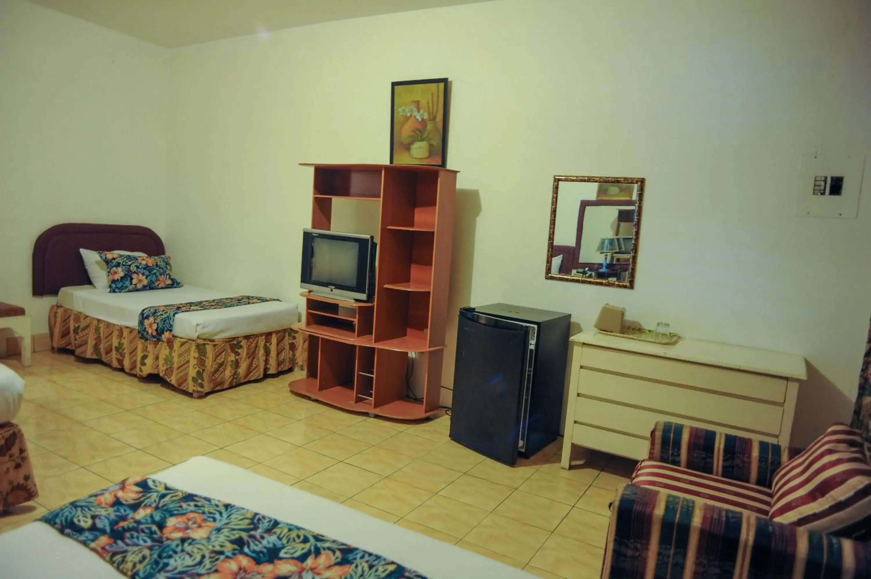 Bed in Glorianna Hotel Bed in Glorianna Hotel