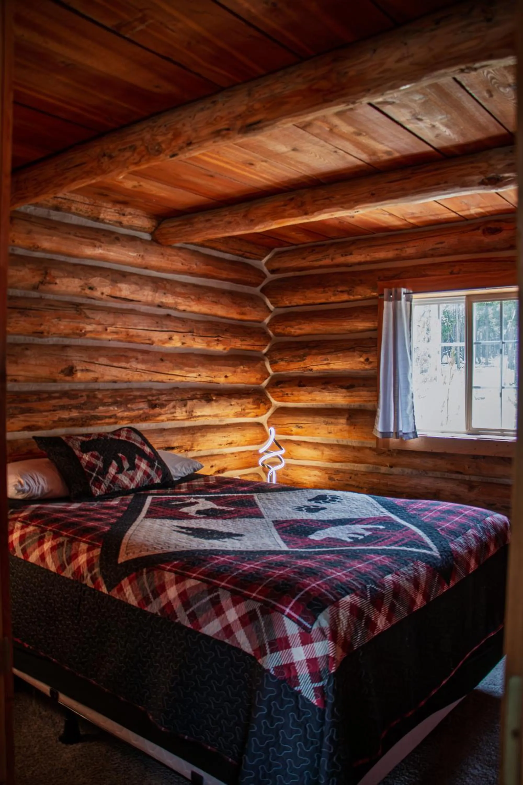 Bed in Crooked Creek Guest Ranch