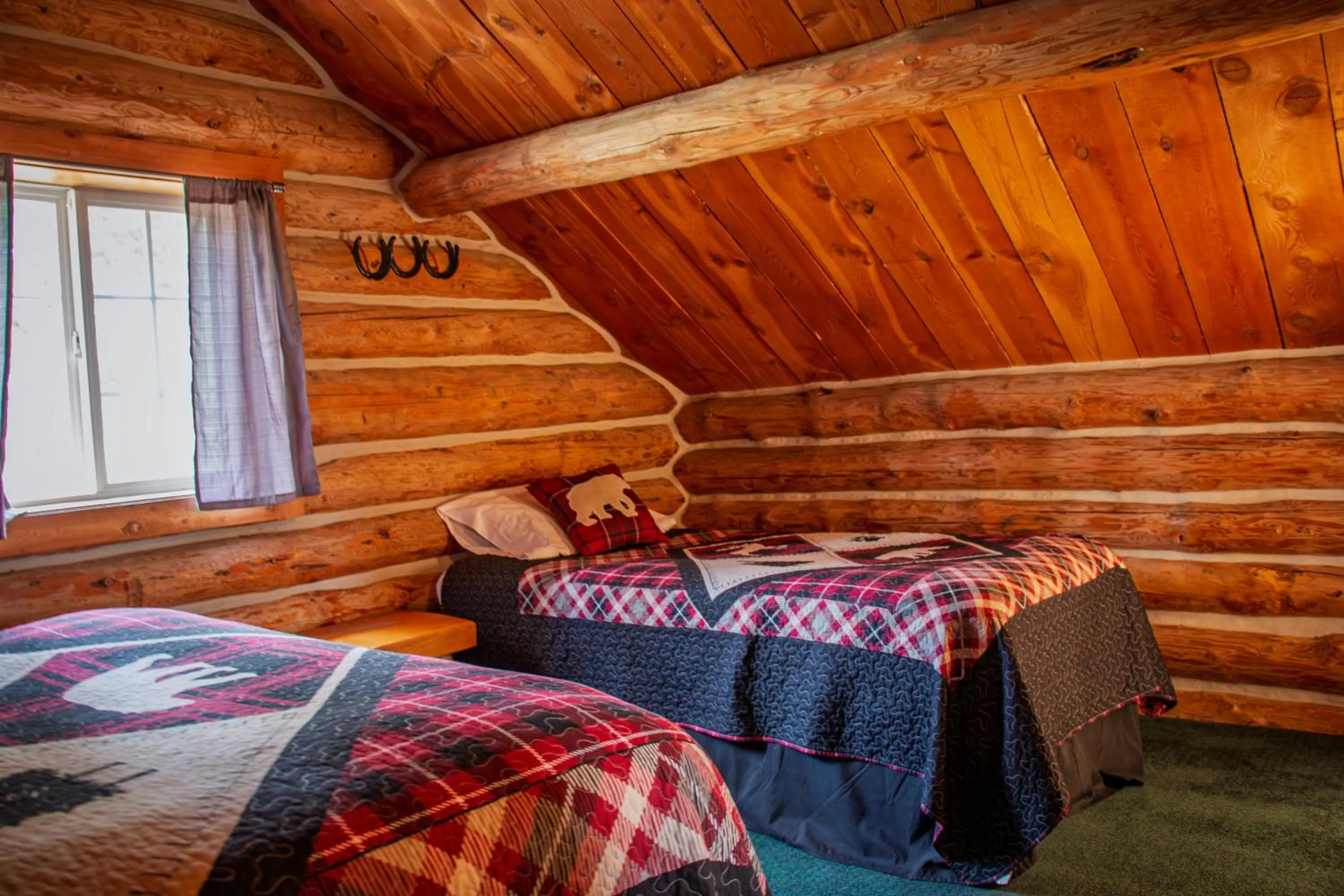 Bed in Crooked Creek Guest Ranch