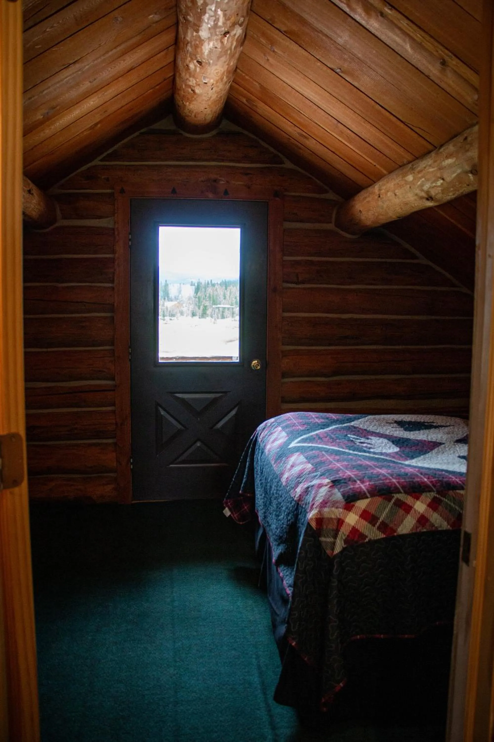 Bed in Crooked Creek Guest Ranch