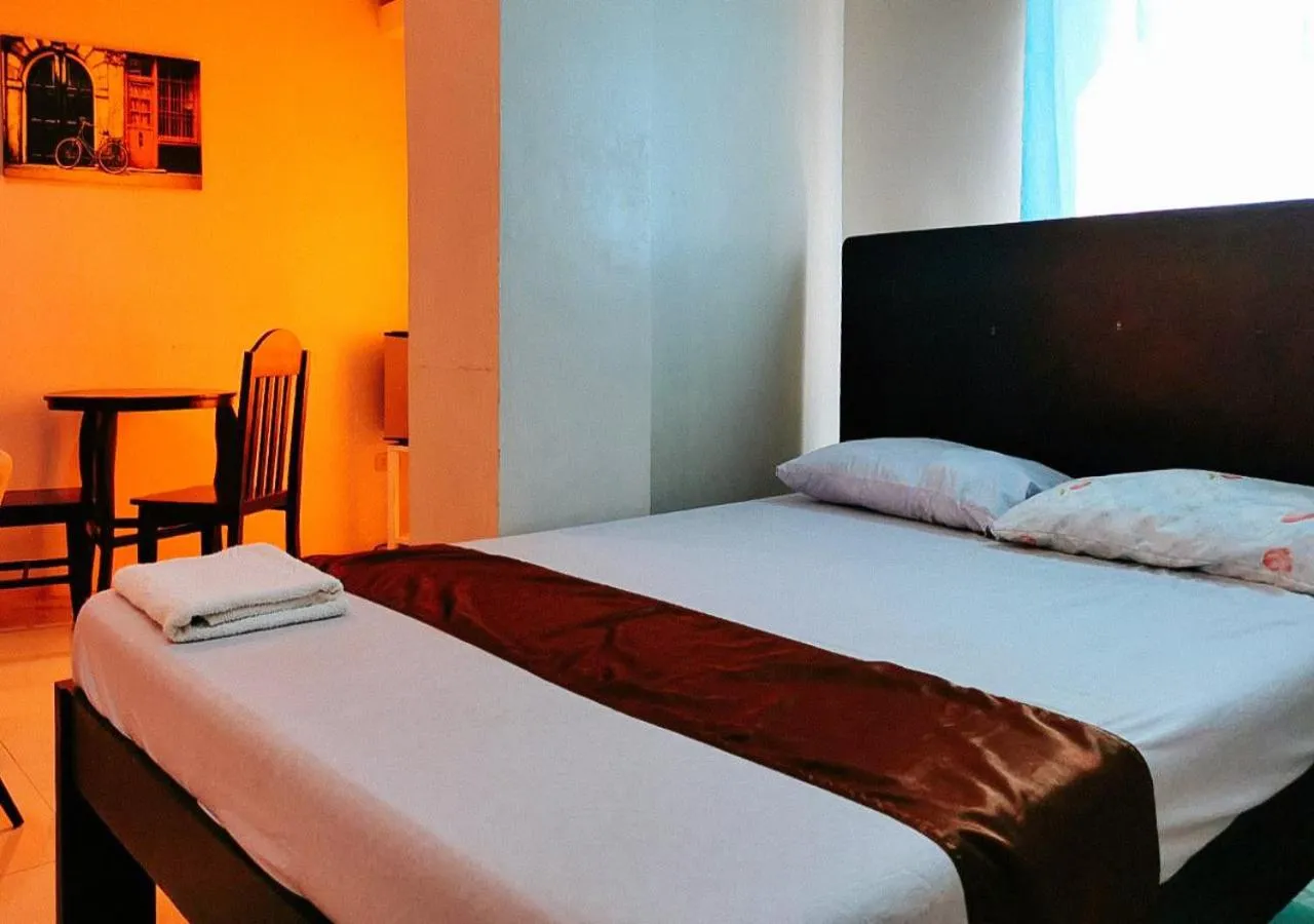 Bedroom, Bed in RedDoorz Segra Square Pension House