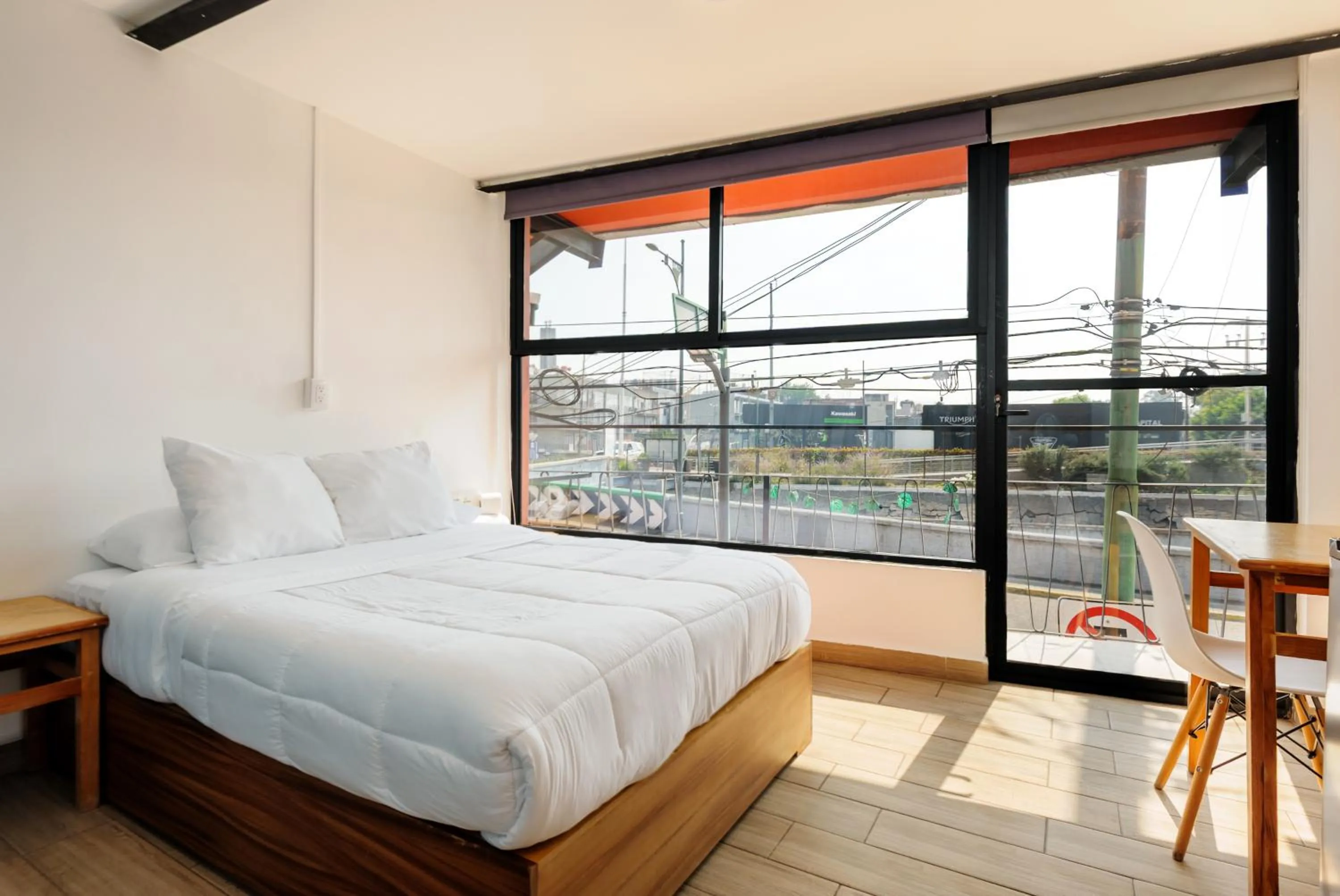 Bedroom, Bed in Colmena Hotel CDMX Suites Roma