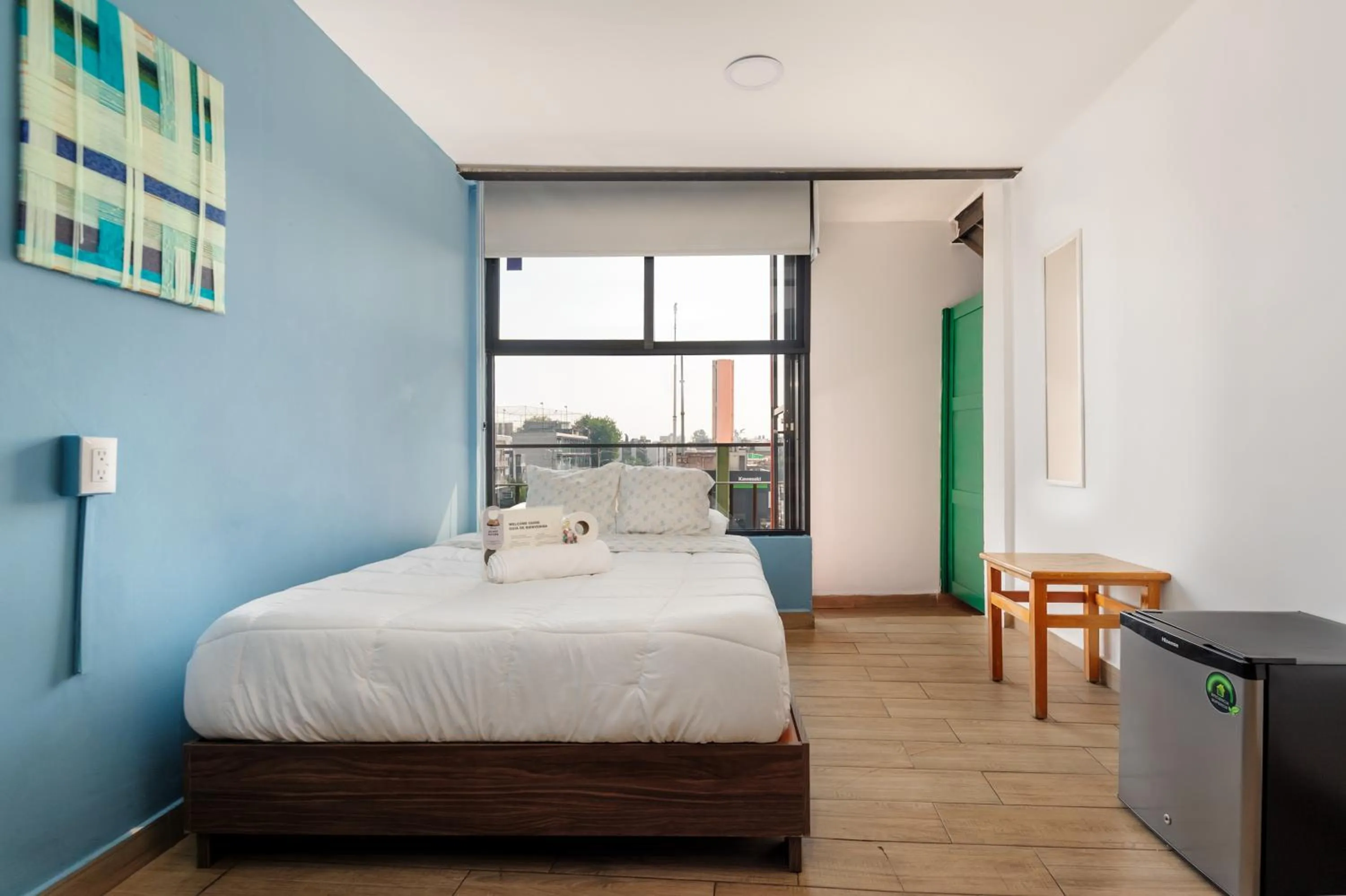 Bedroom, Bed in Colmena Hotel CDMX Suites Roma