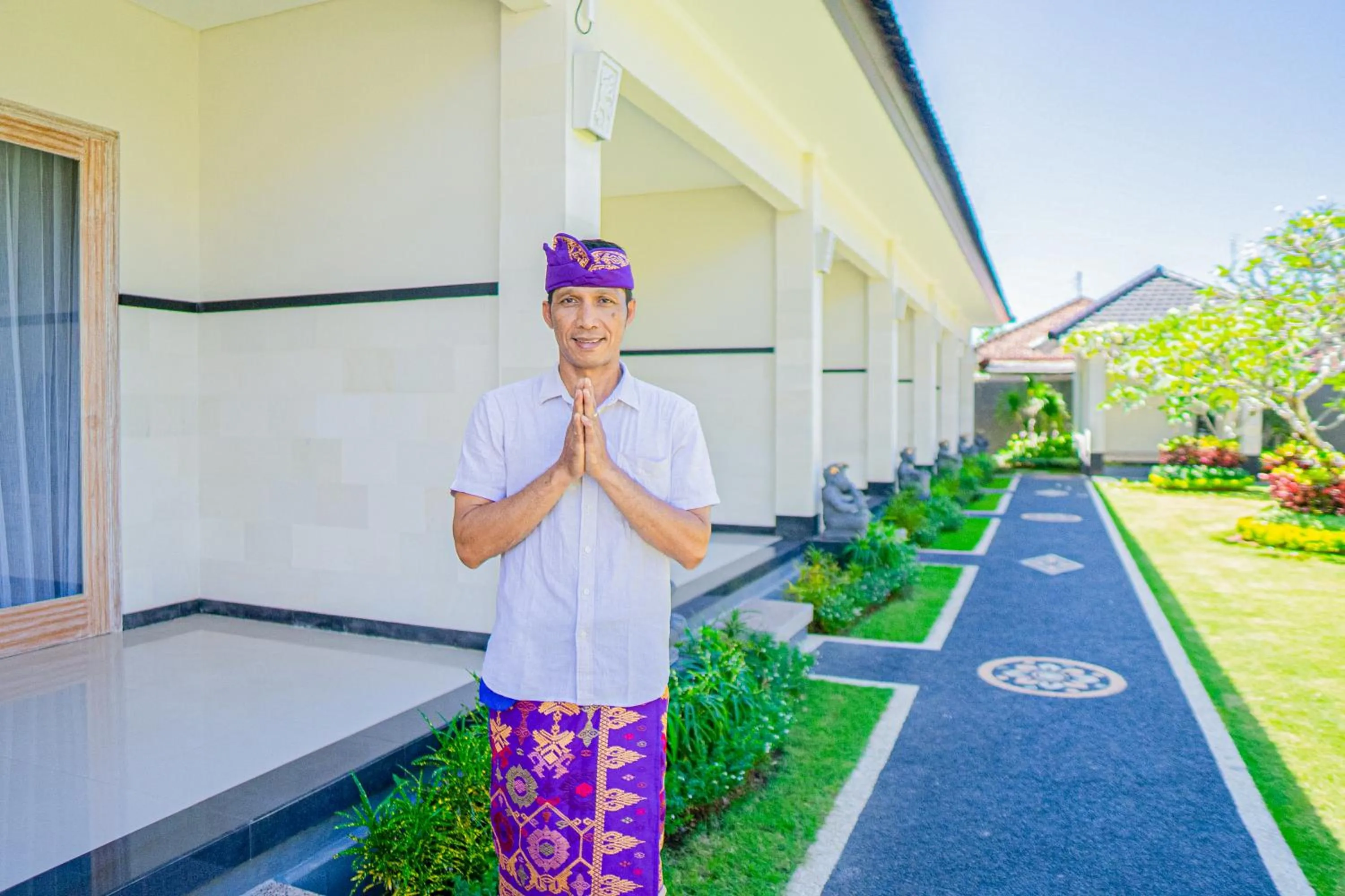 Staff in Green D'mel Bali