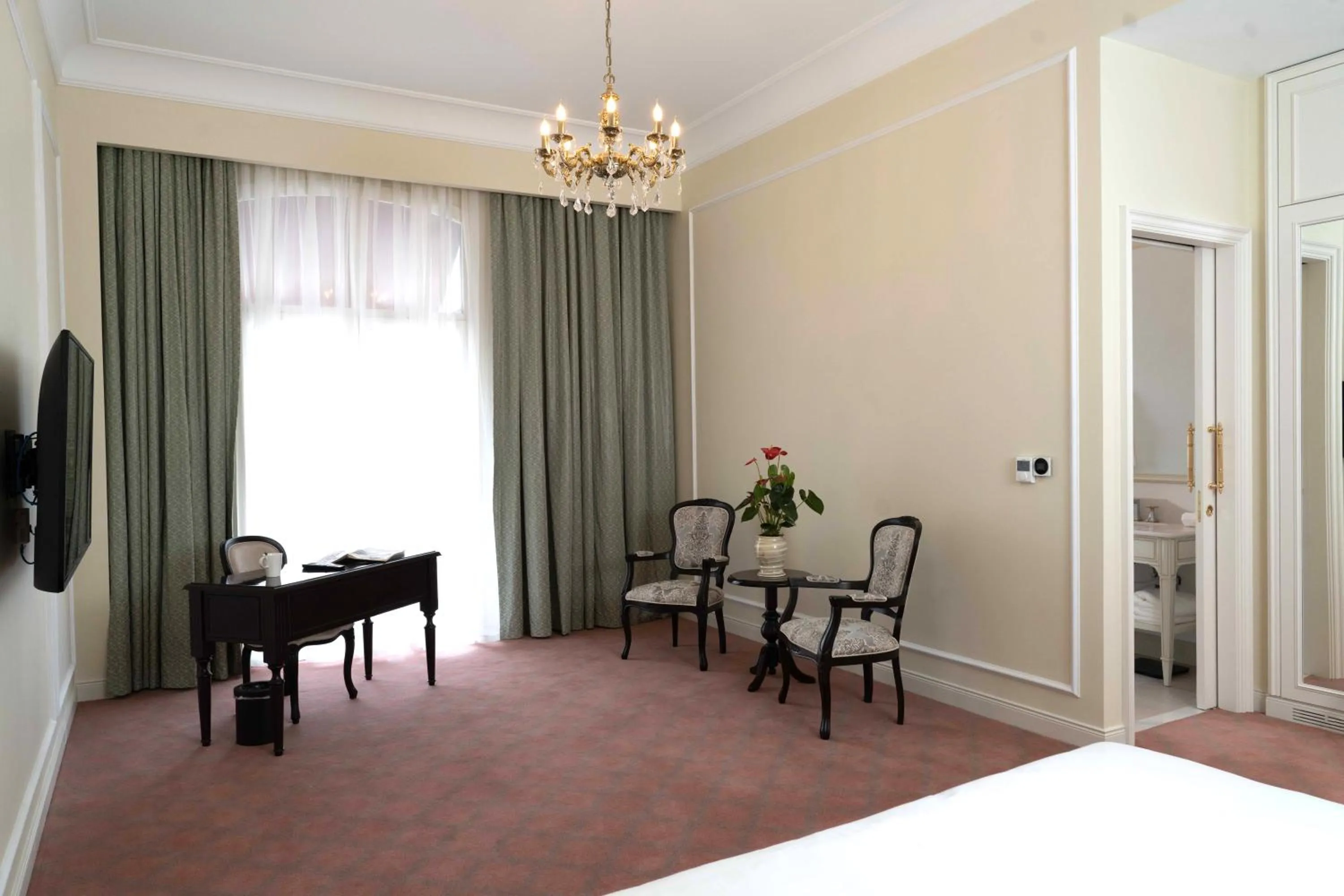 Seating area, Bed in ANIM Boutique Hotel