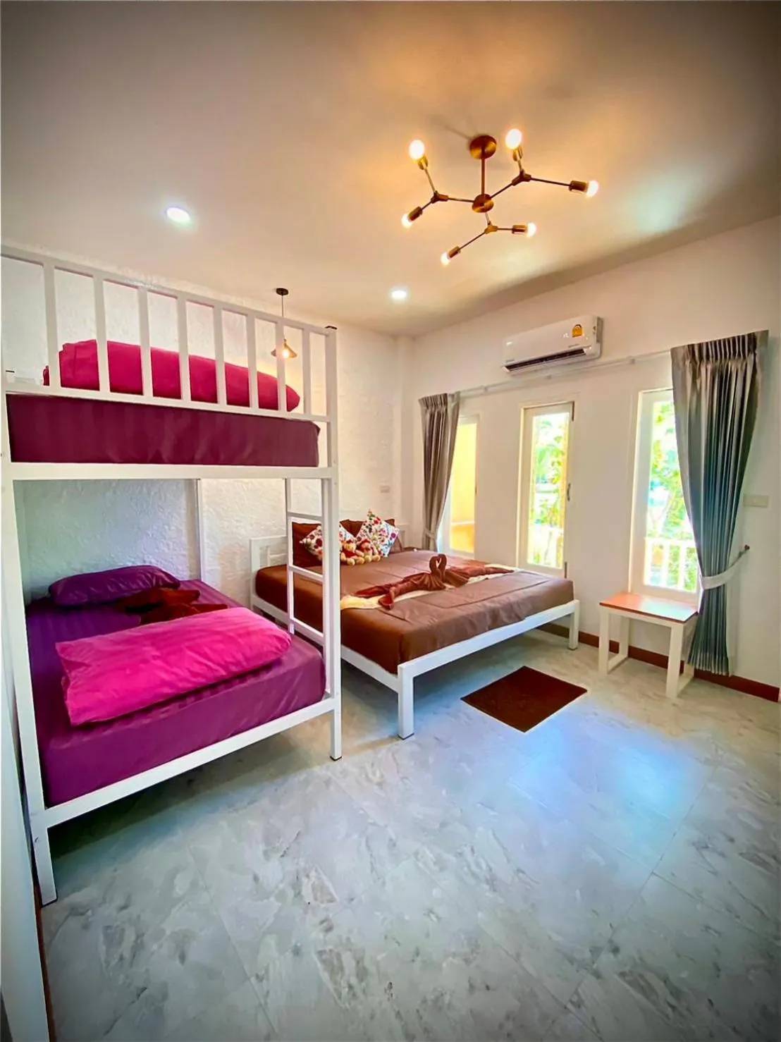 Bed in Trang Oasis Waterpark Hotel