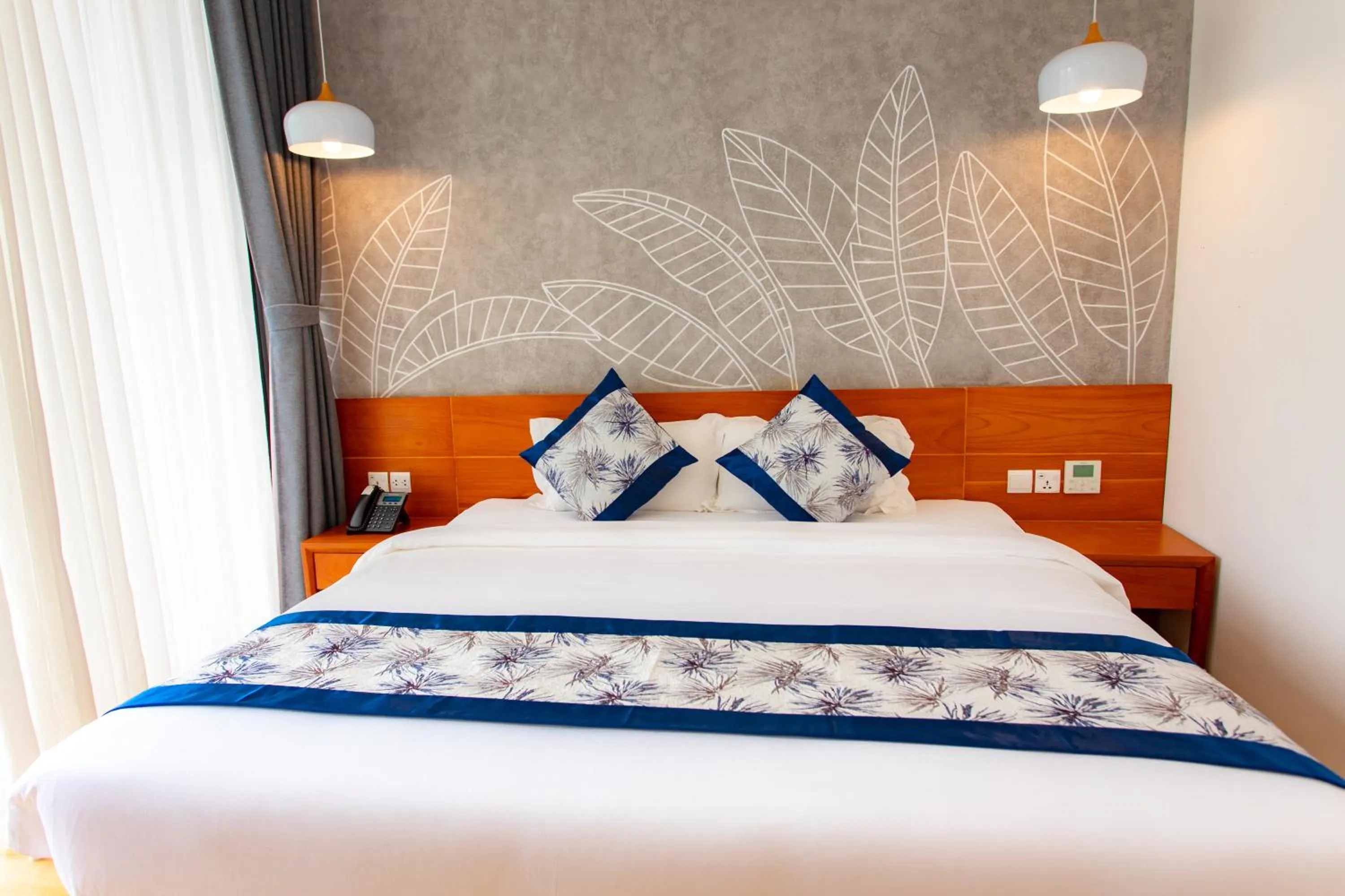 Bed in Wyndham Grand Vedana Ninh Binh Resort