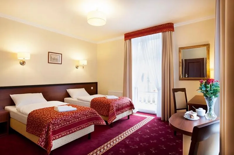 Bed in Resort de Esperanto Sanatorium Uzdrowiskowe