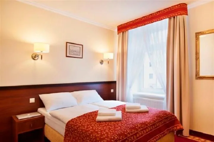 Bed in Resort de Esperanto Sanatorium Uzdrowiskowe