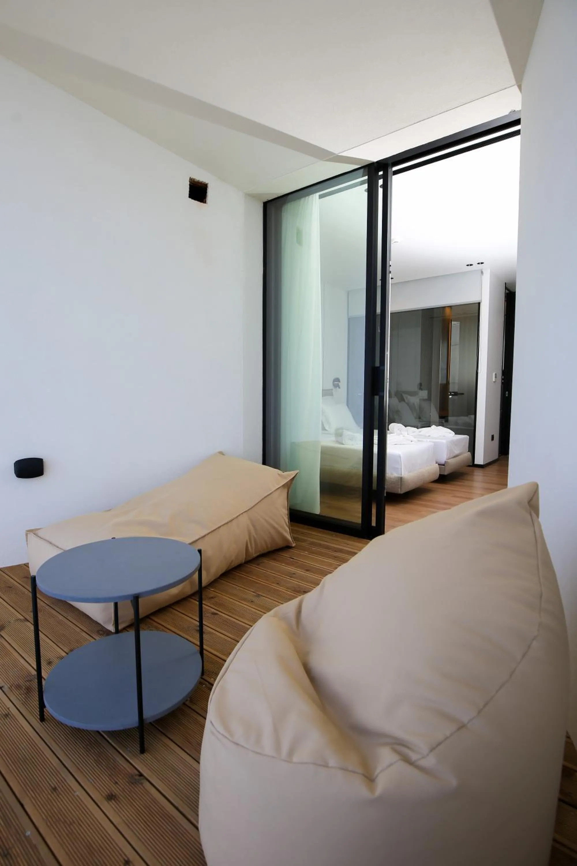 Seating area, Bed in Nobus Hotel & Spa