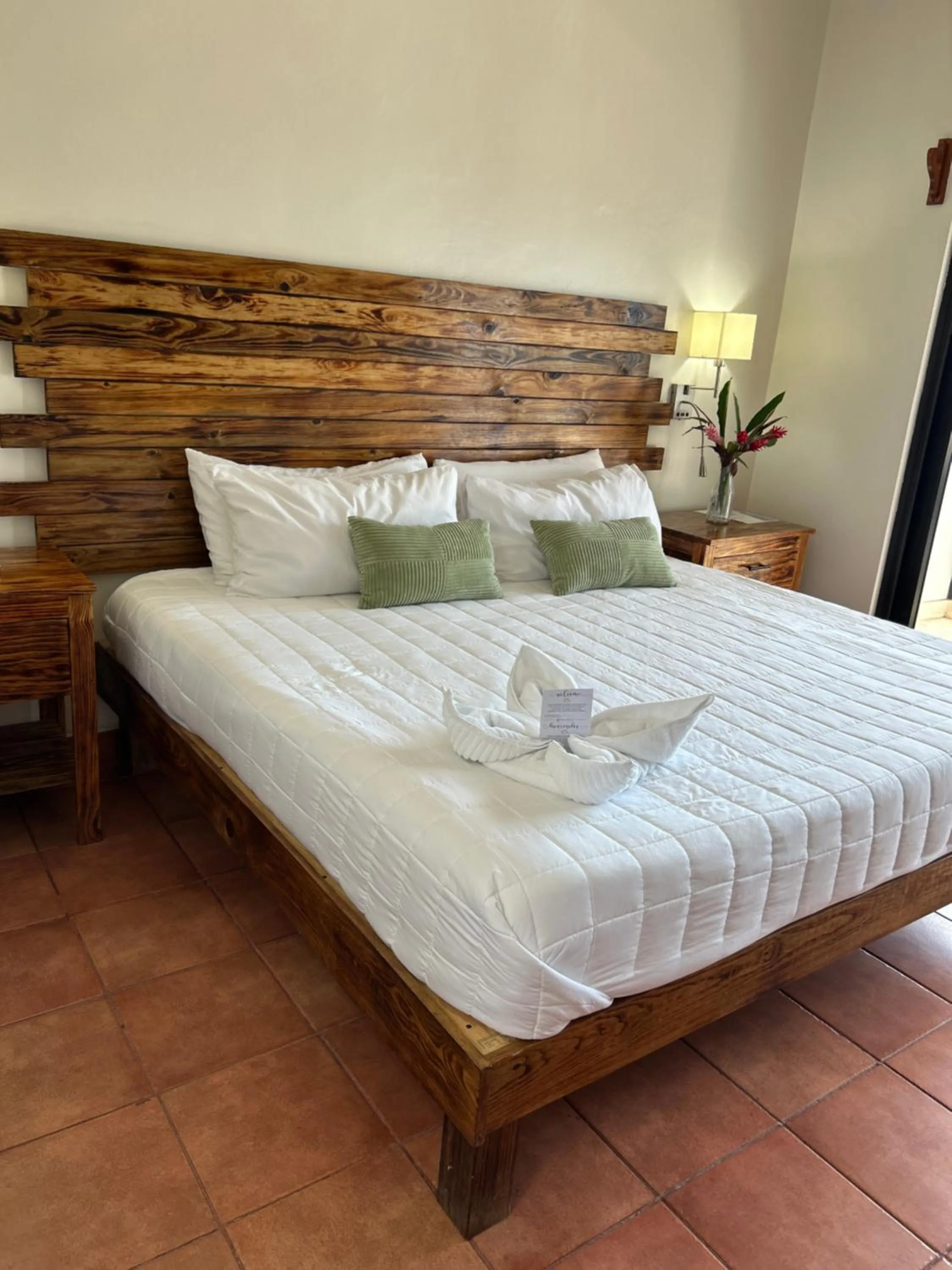 Bed in Brisas Del Mar Beach + Dive Resort