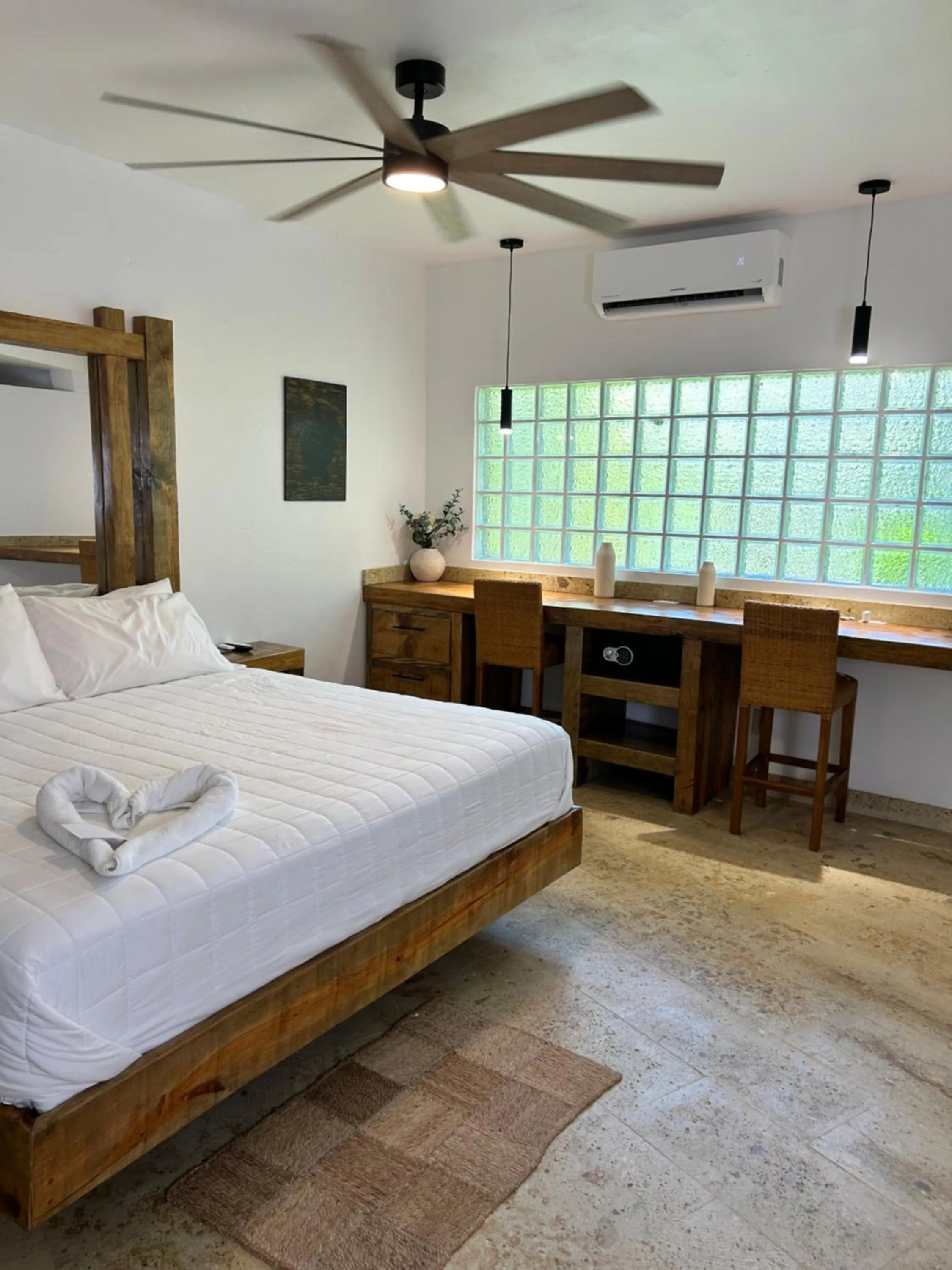 Bed in Brisas Del Mar Beach + Dive Resort