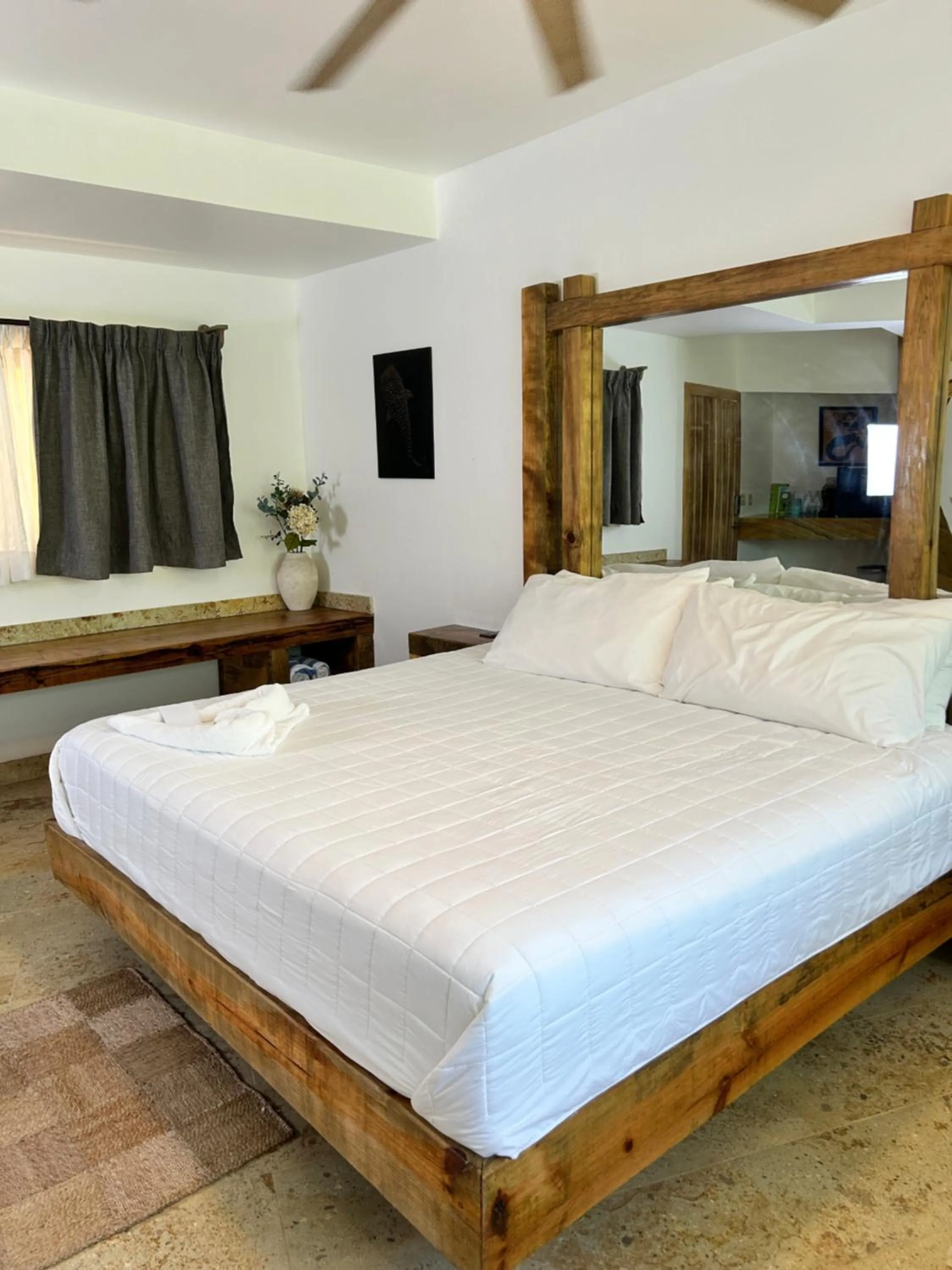 Bed in Brisas Del Mar Beach + Dive Resort