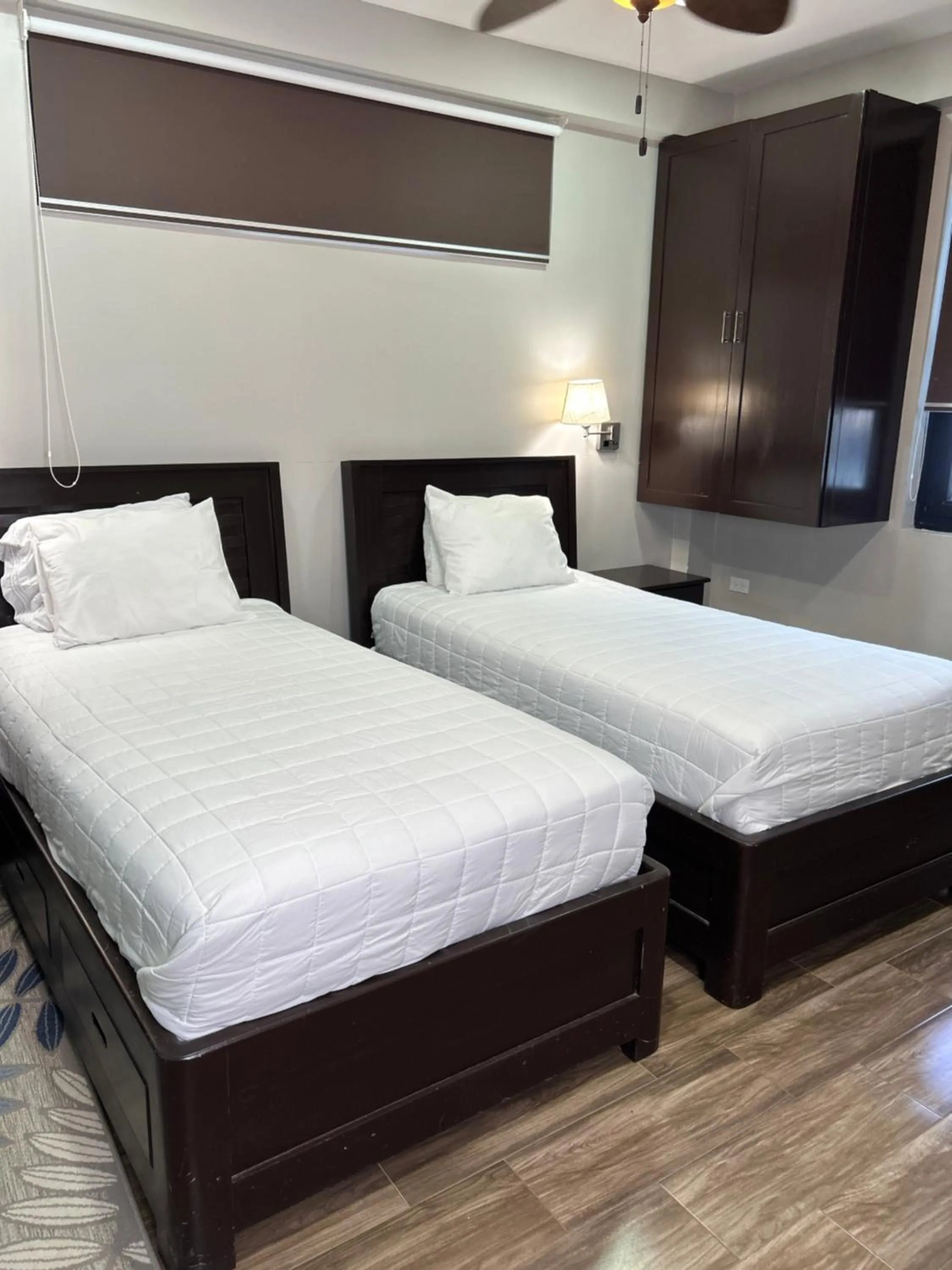 Bed in Brisas Del Mar Beach + Dive Resort