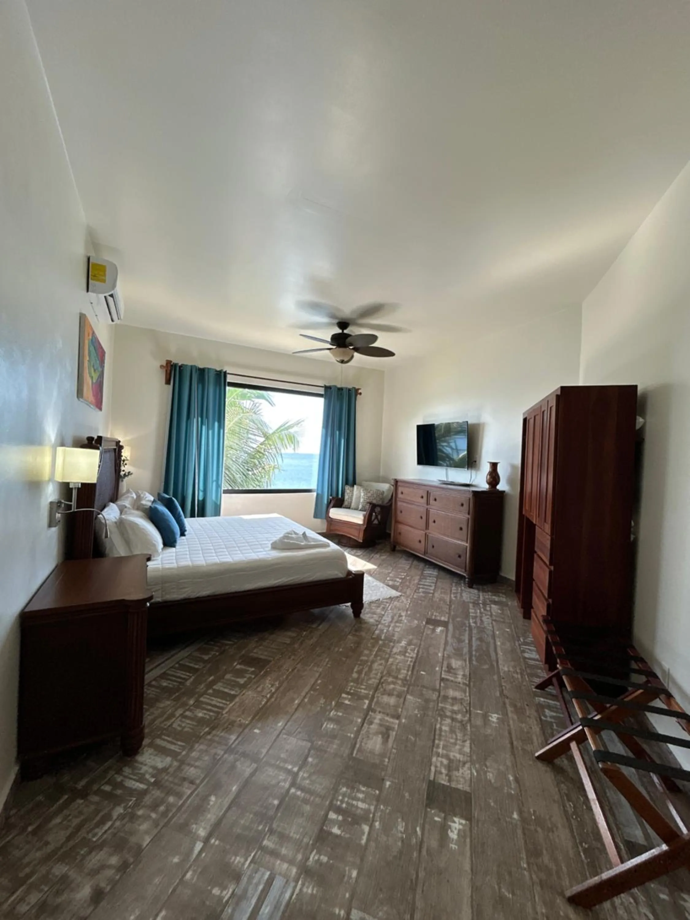 Bed in Brisas Del Mar Beach + Dive Resort