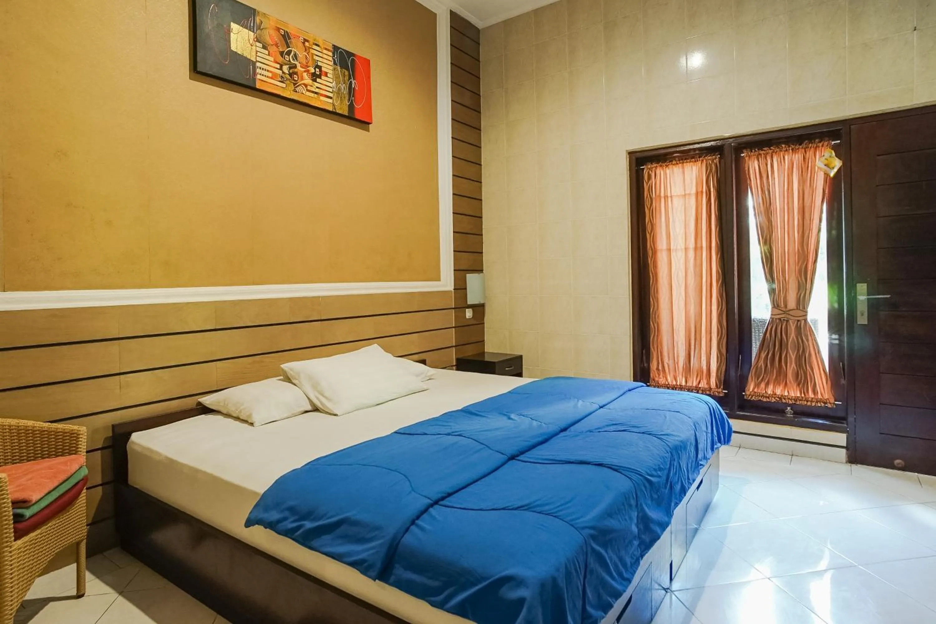 Bed in DENAYS GUESTHOUSE JIMBARAN