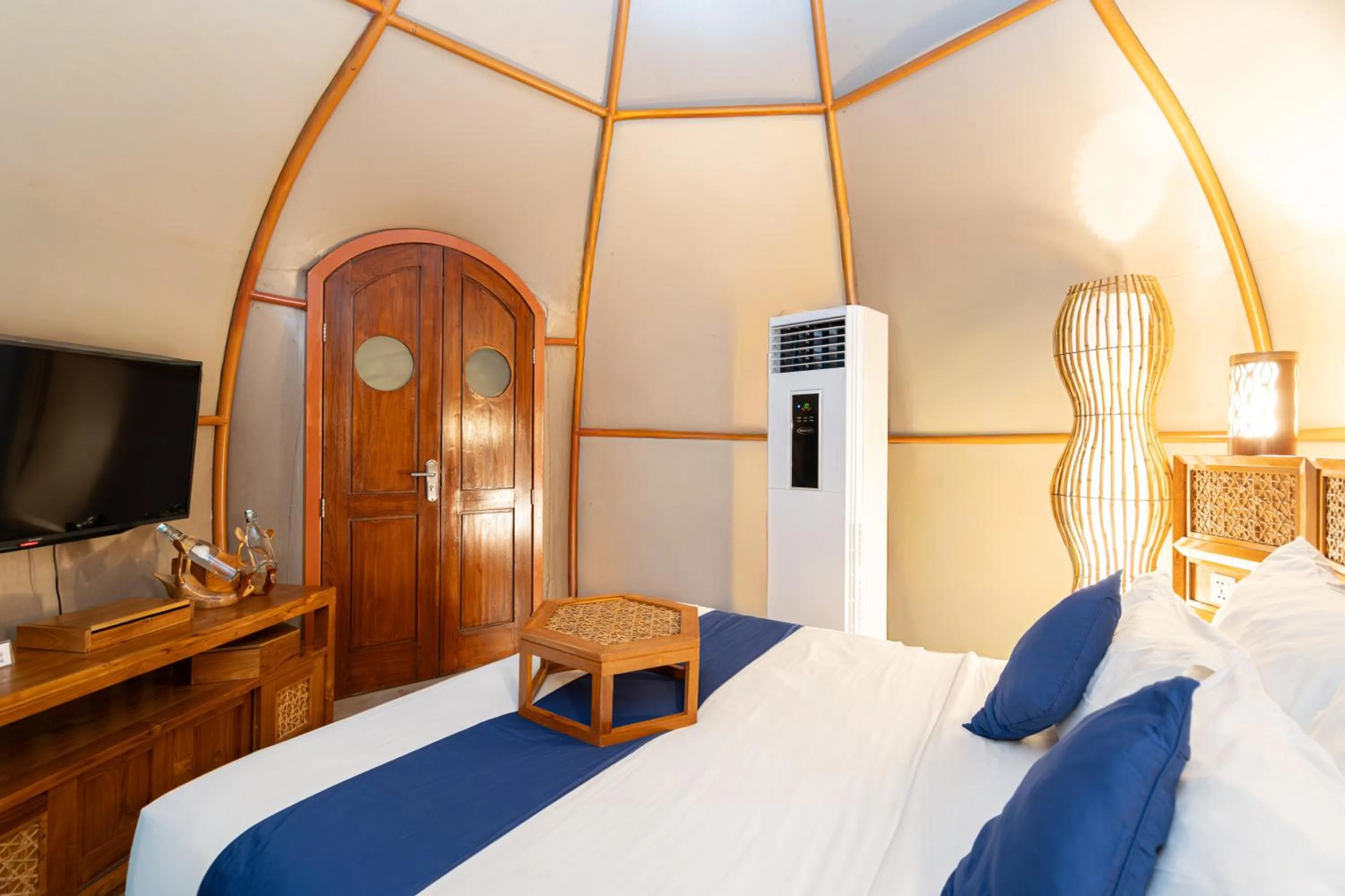 Bed in Triyana Resort and Glamping