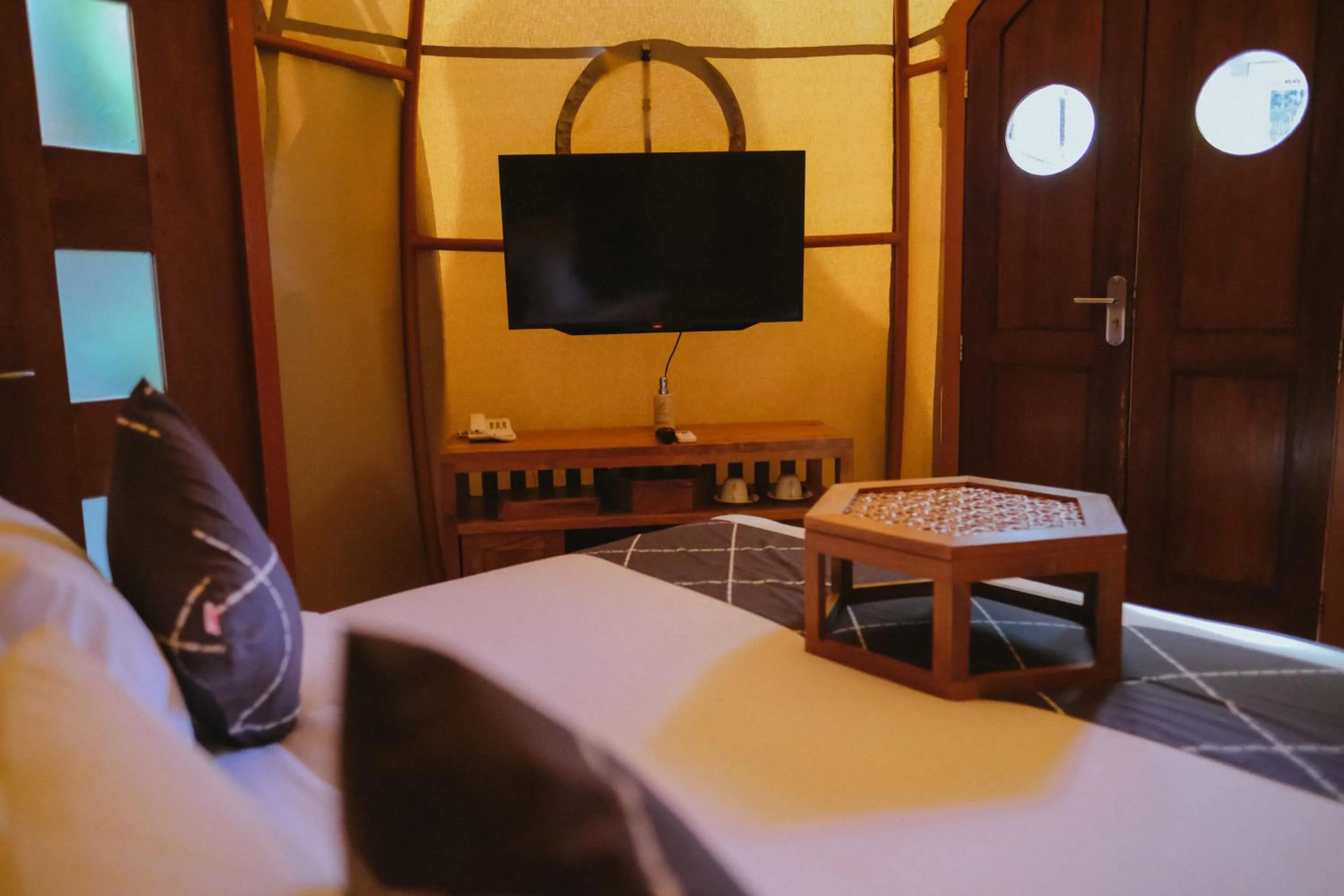 Bed in Triyana Resort and Glamping