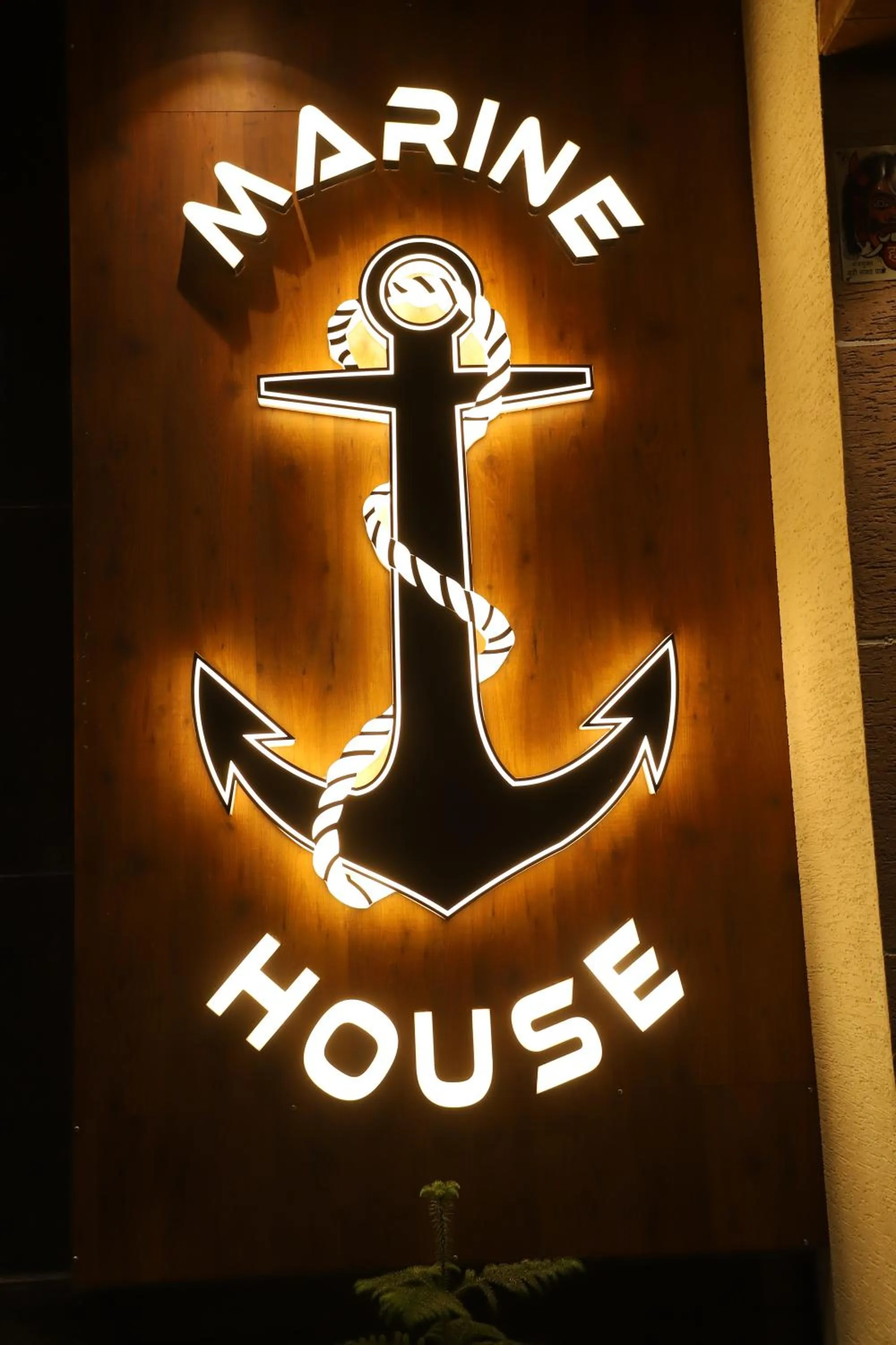 Property logo or sign in Hotel Marine House