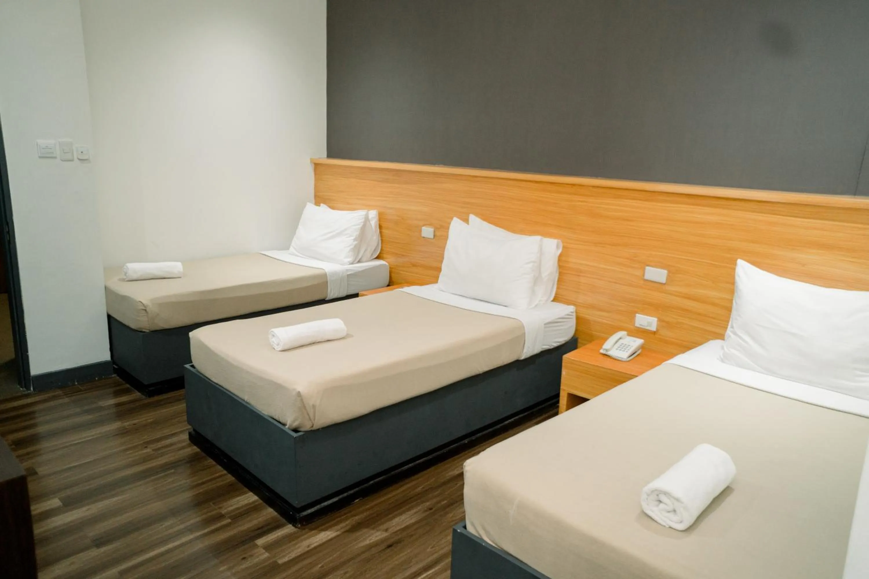 Bed in Greenwindows Hotel