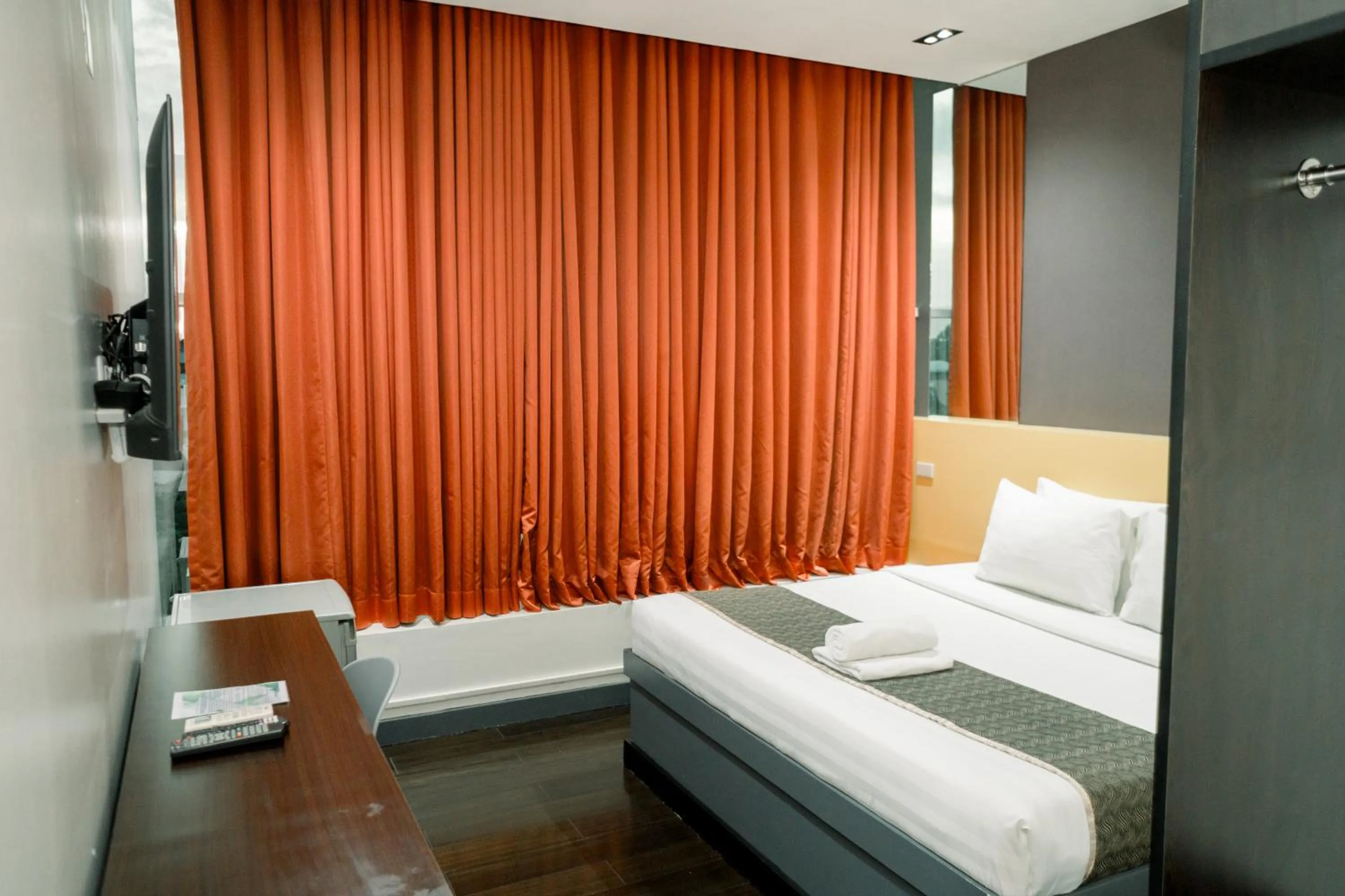 Bed in Greenwindows Hotel