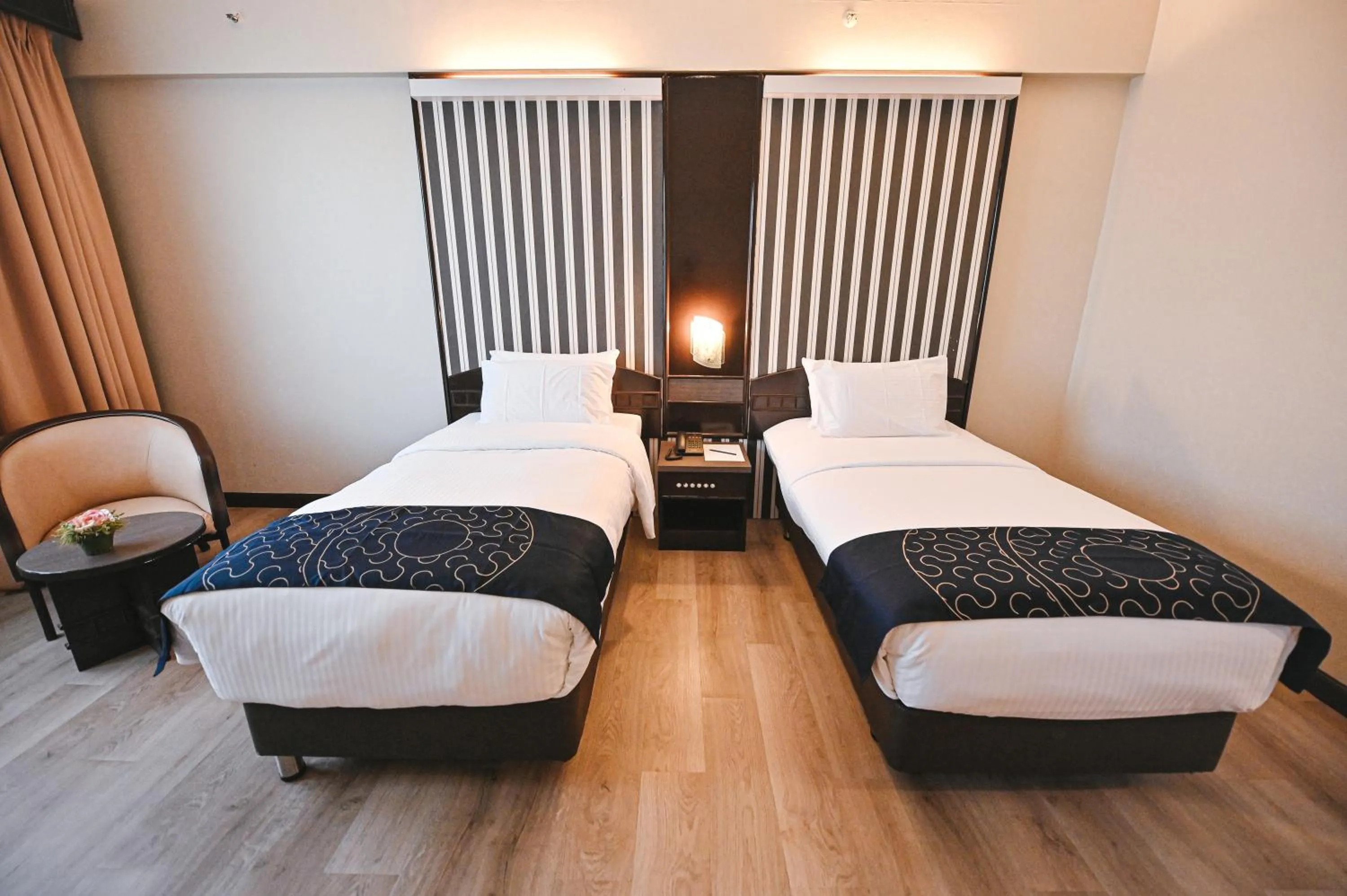 Bed in PRIME CITY HOTEL KLUANG