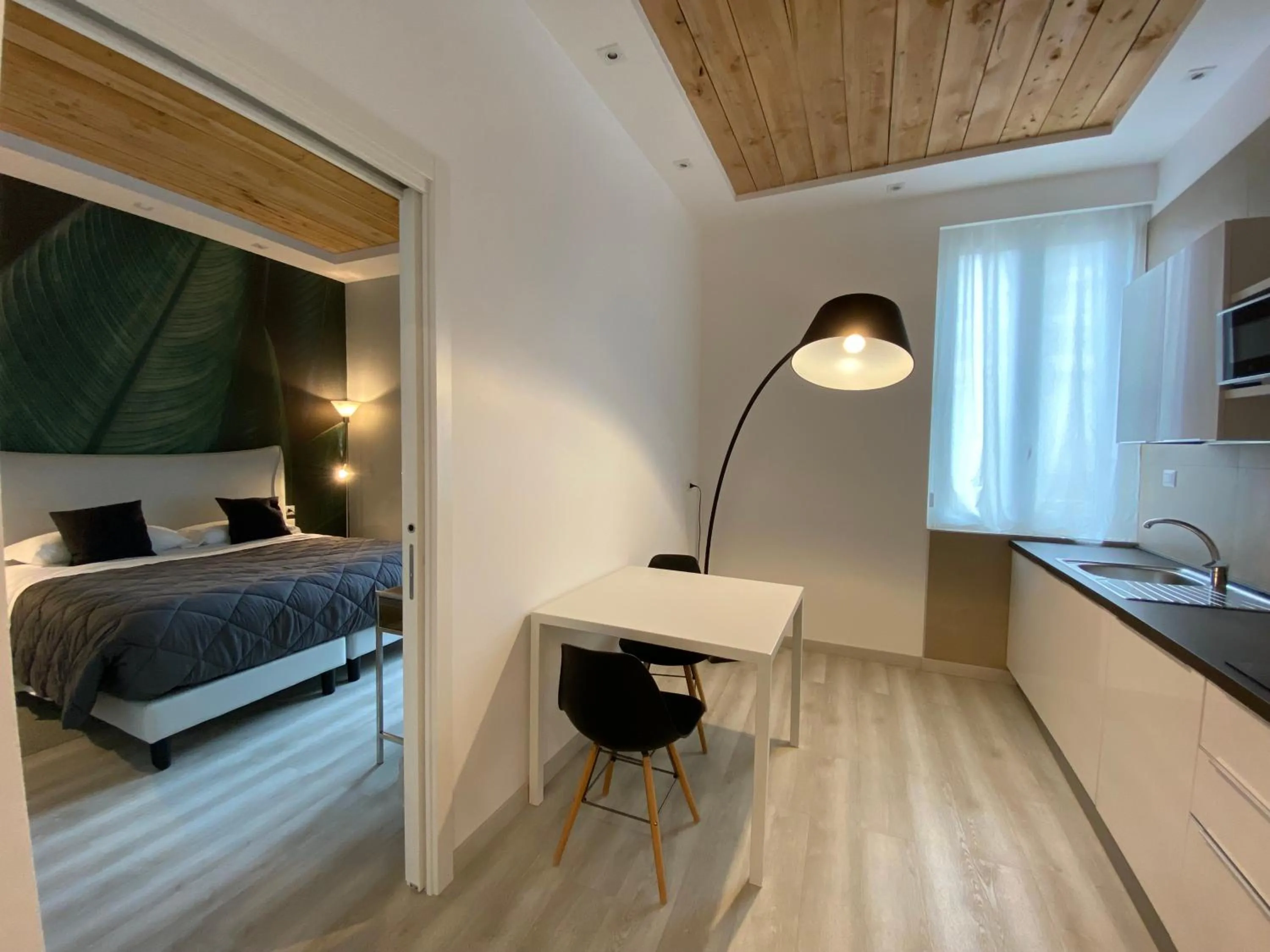 Living room, Bed in Residenze Romano Ristorante & SPA albergo diffuso - WHITE