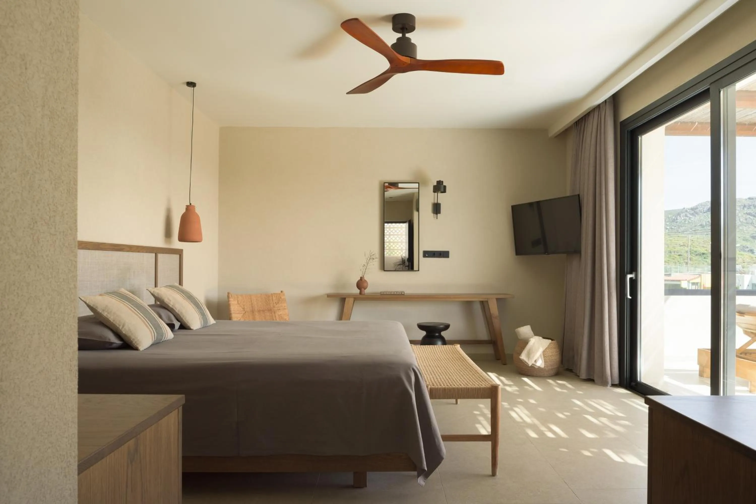 Bed in KYMANI Boutique Hotel & Suites