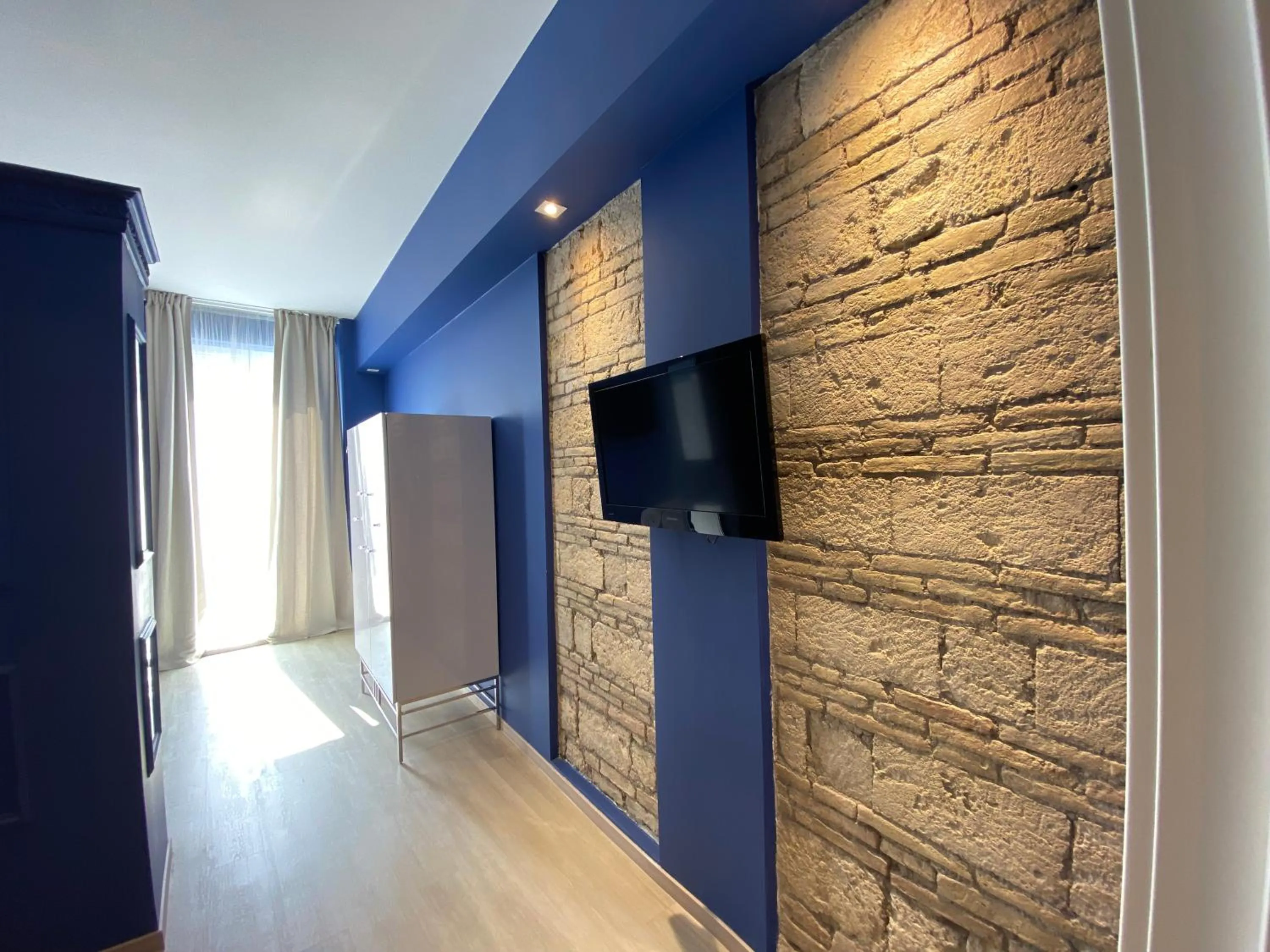 TV and multimedia in Residenze Romano Ristorante & Spa - albergo diffuso - RED